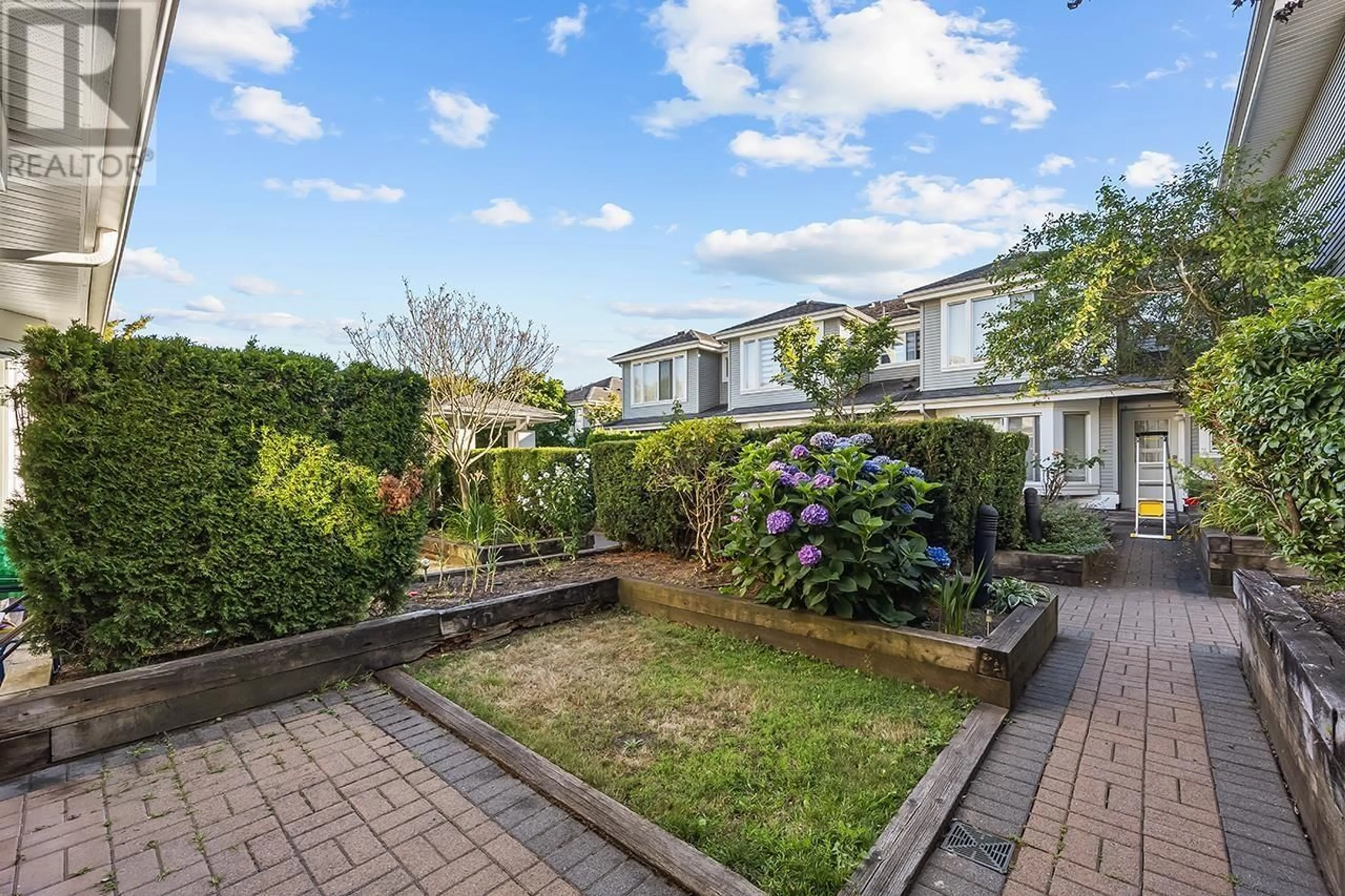 A pic from outside/outdoor area/front of a property/back of a property/a pic from drone, street for 10 - 7370 STRIDE AVENUE, Burnaby British Columbia V3N5E6
