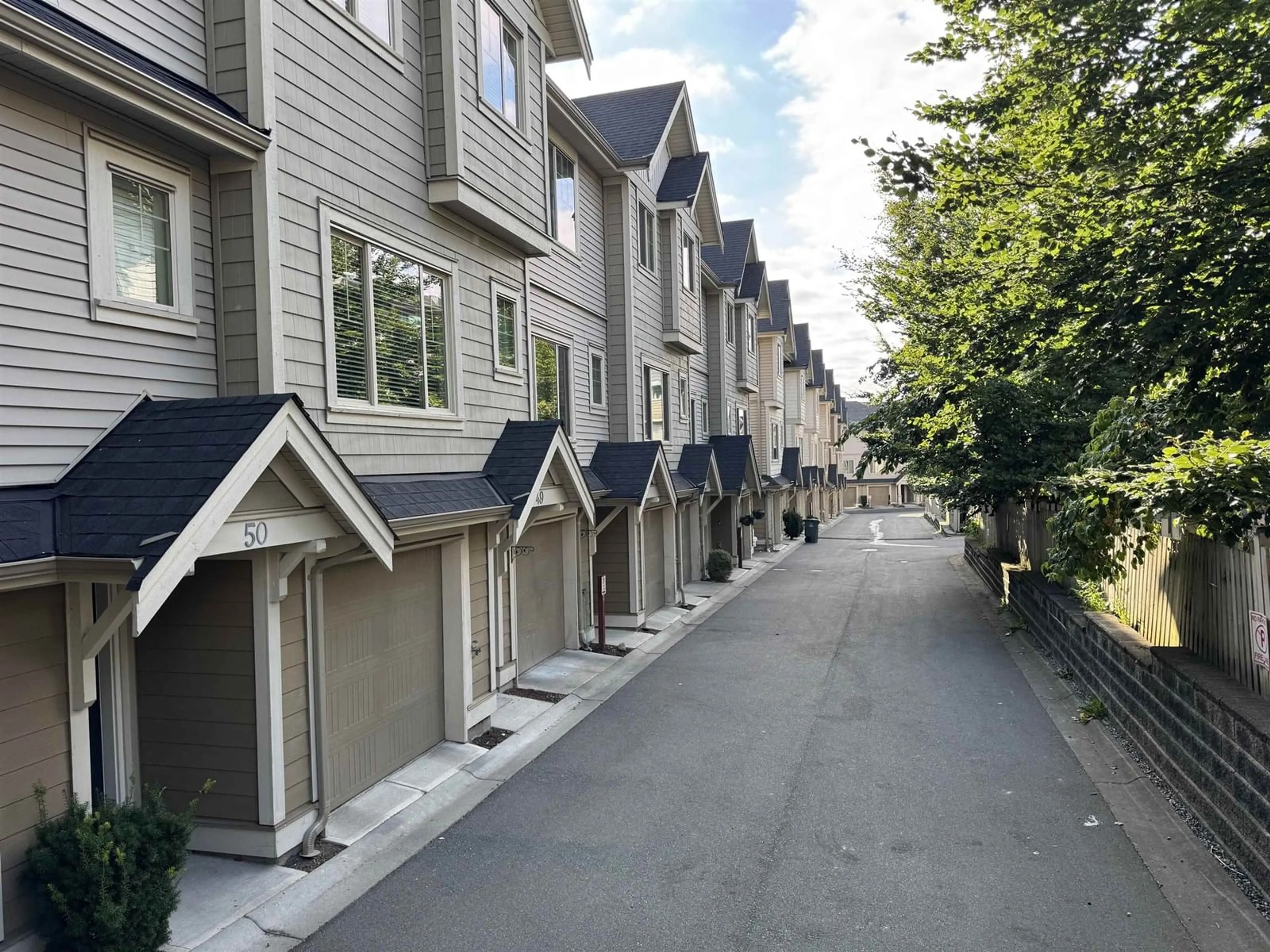 A pic from outside/outdoor area/front of a property/back of a property/a pic from drone, street for 48 - 19097 64, Surrey British Columbia V3S6X5