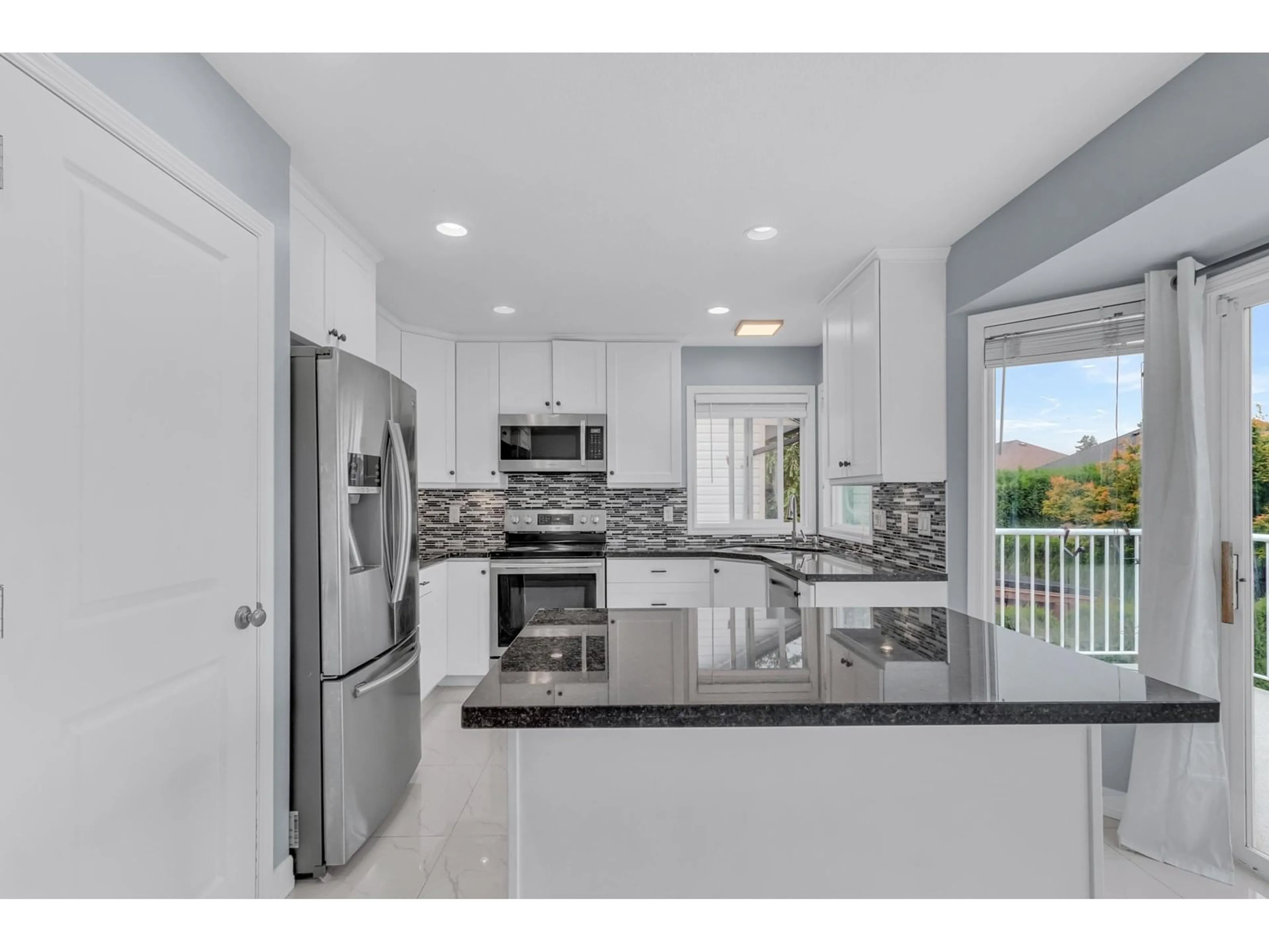 Open concept kitchen, ceramic/tile floor for 5664 VILLA ROSA PLACE, Chilliwack British Columbia V2R3K6