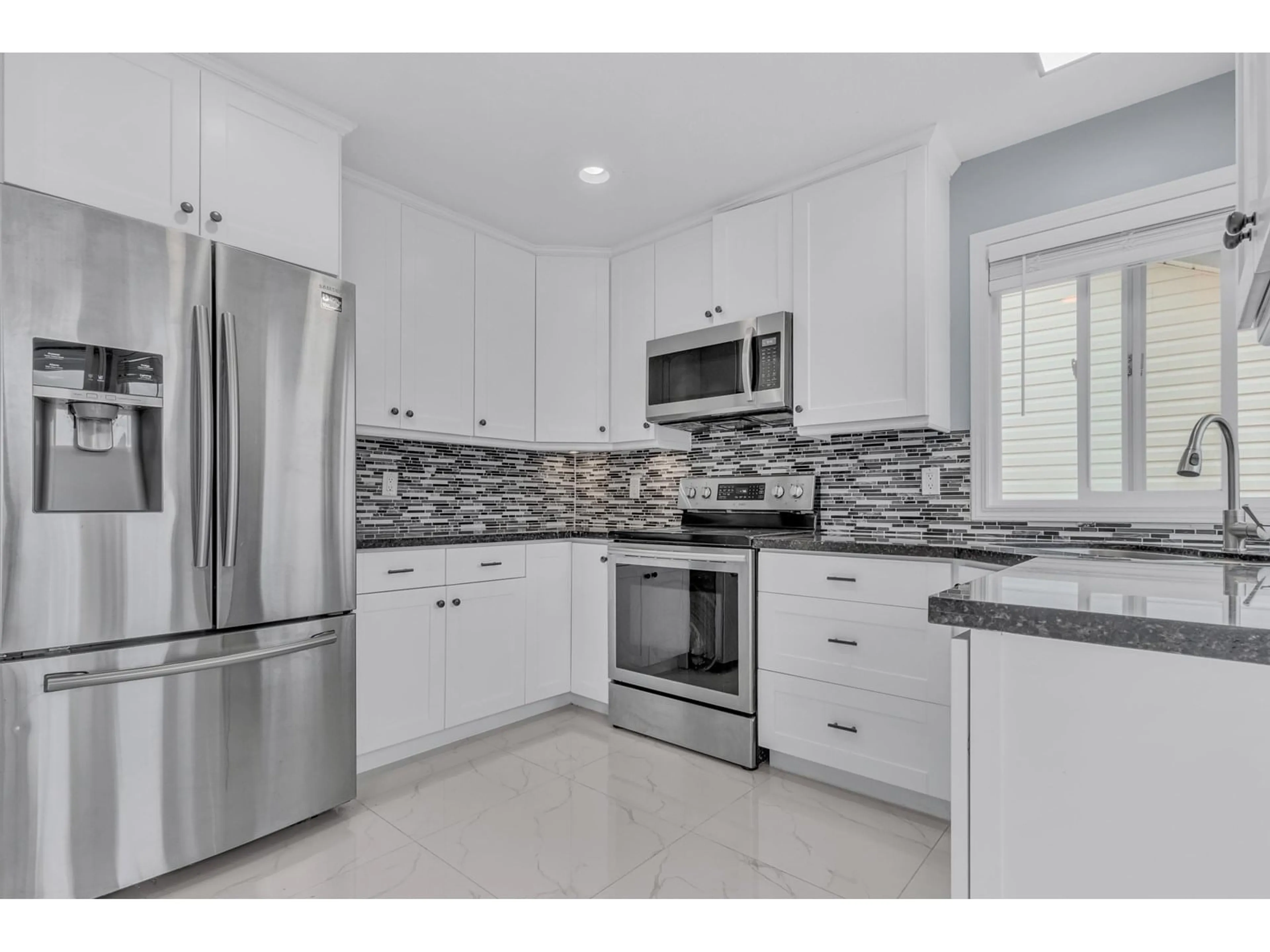 Open concept kitchen, ceramic/tile floor for 5664 VILLA ROSA PLACE, Chilliwack British Columbia V2R3K6