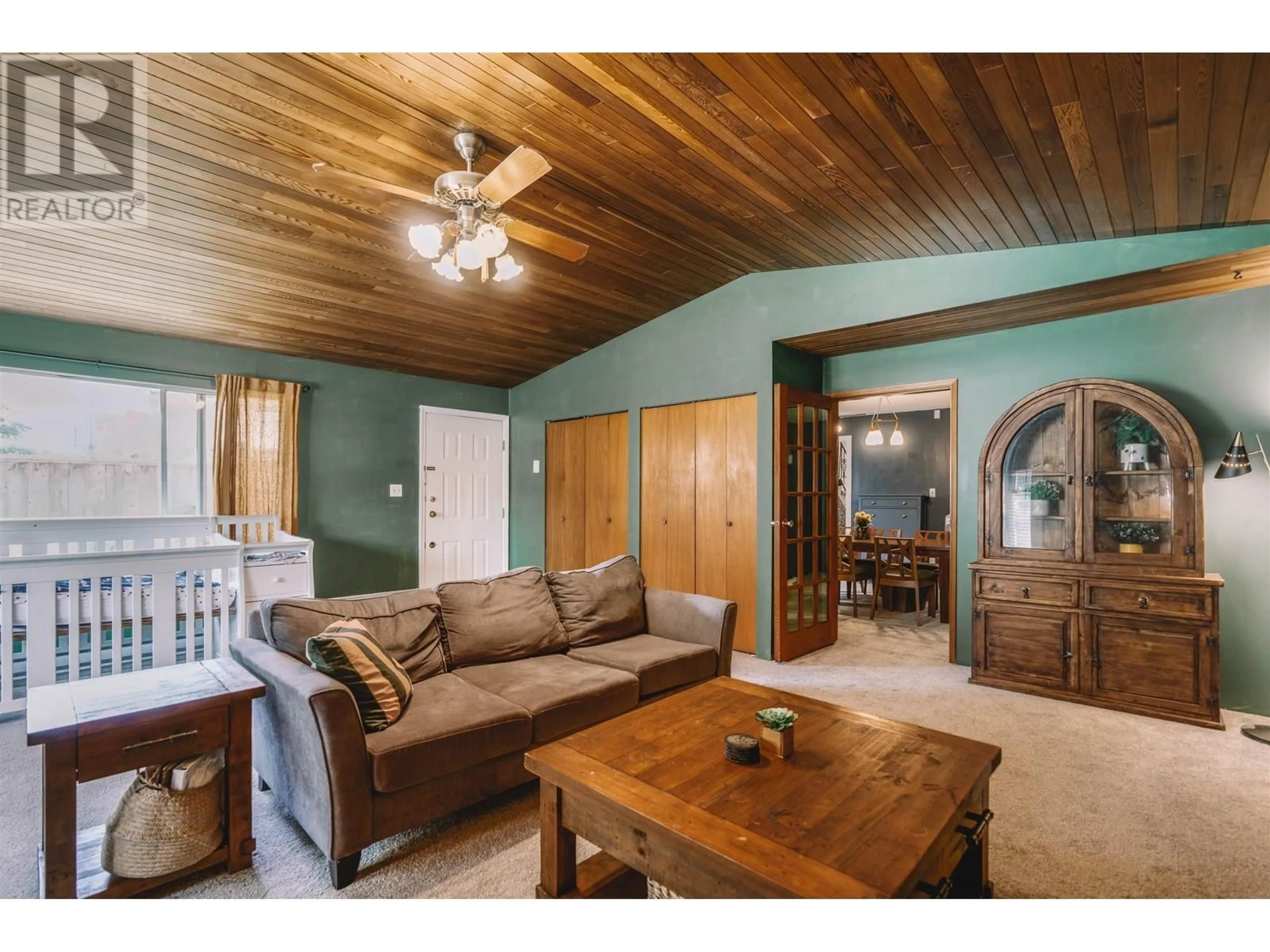 Living room with furniture, wood/laminate floor for 3320 JERVIS STREET, Port Coquitlam British Columbia V3B4P3