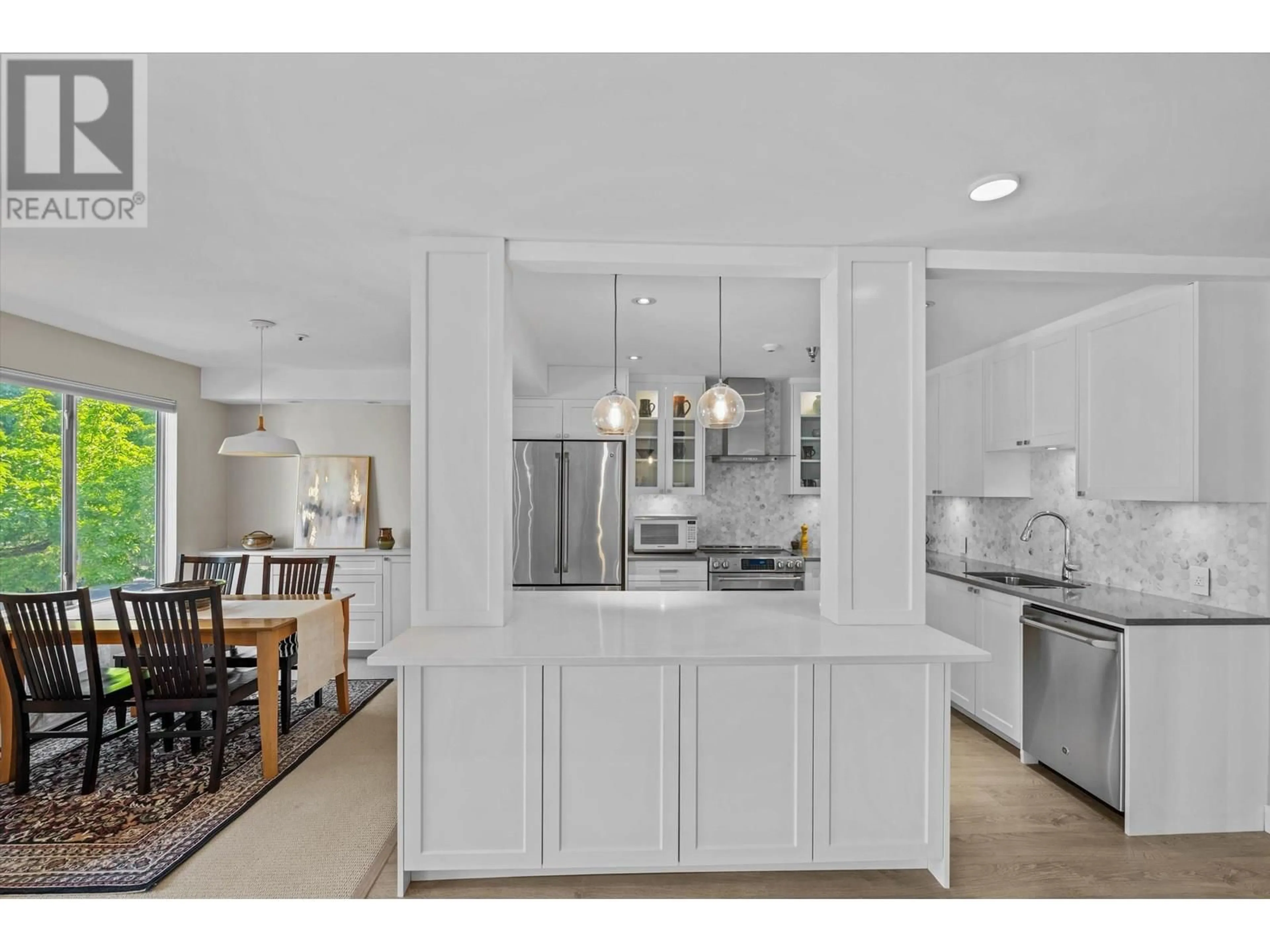 Open concept kitchen, ceramic/tile floor for 201 - 2288 12TH AVENUE, Vancouver British Columbia V6K4R2