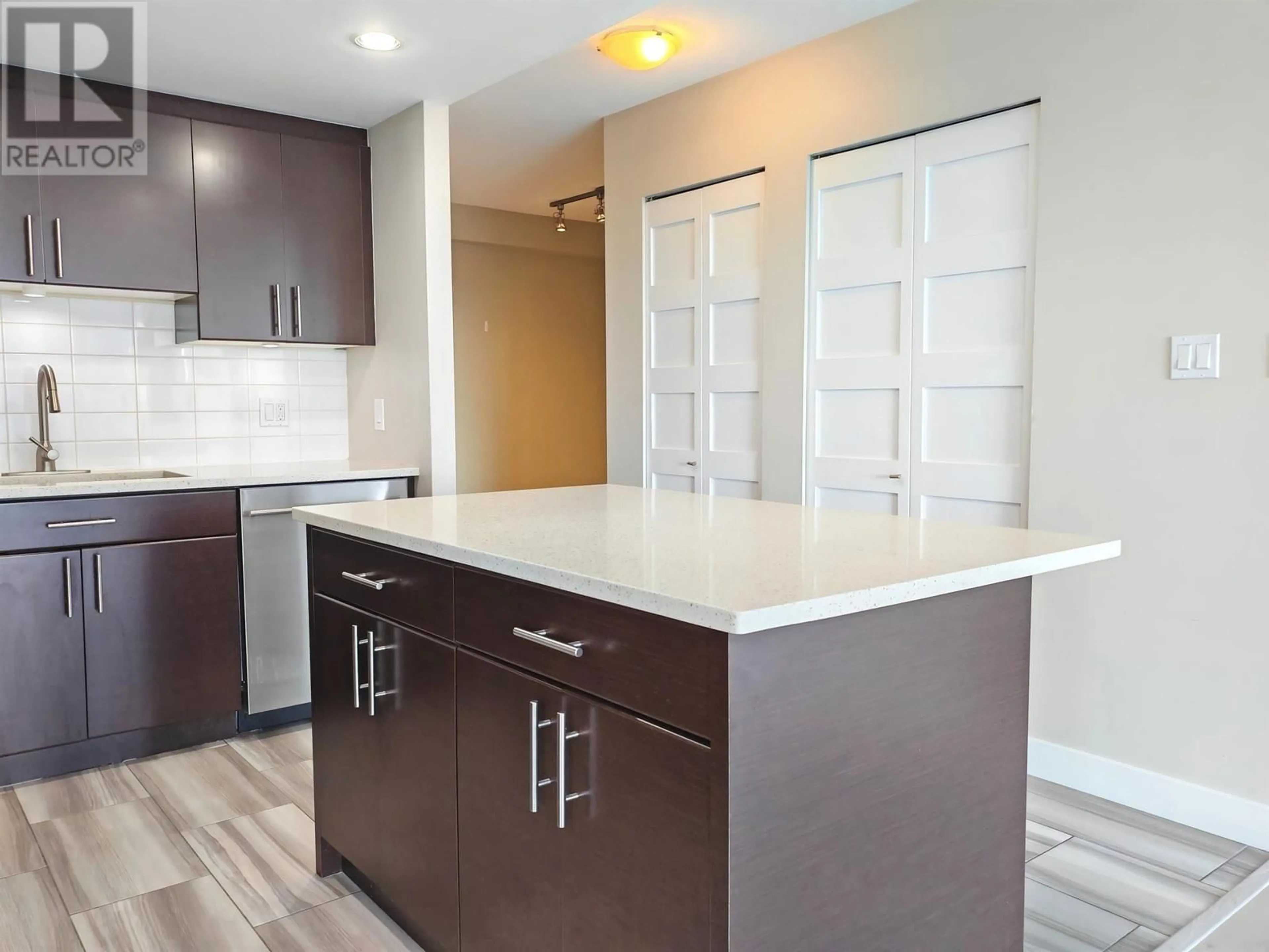 Open concept kitchen, wood/laminate floor for 1704 - 555 DELESTRE AVENUE, Coquitlam British Columbia V3K0A9
