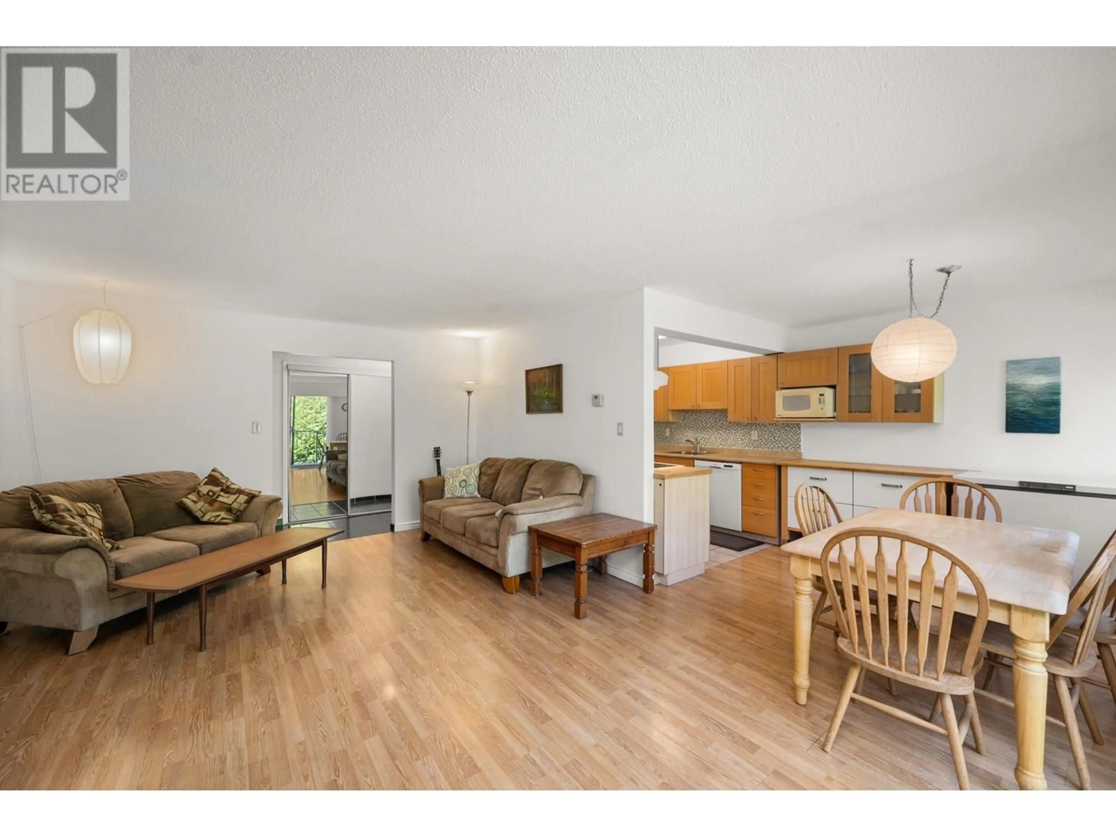 Living room with furniture, wood/laminate floor for 8943 HORNE STREET, Burnaby British Columbia V3N4J8