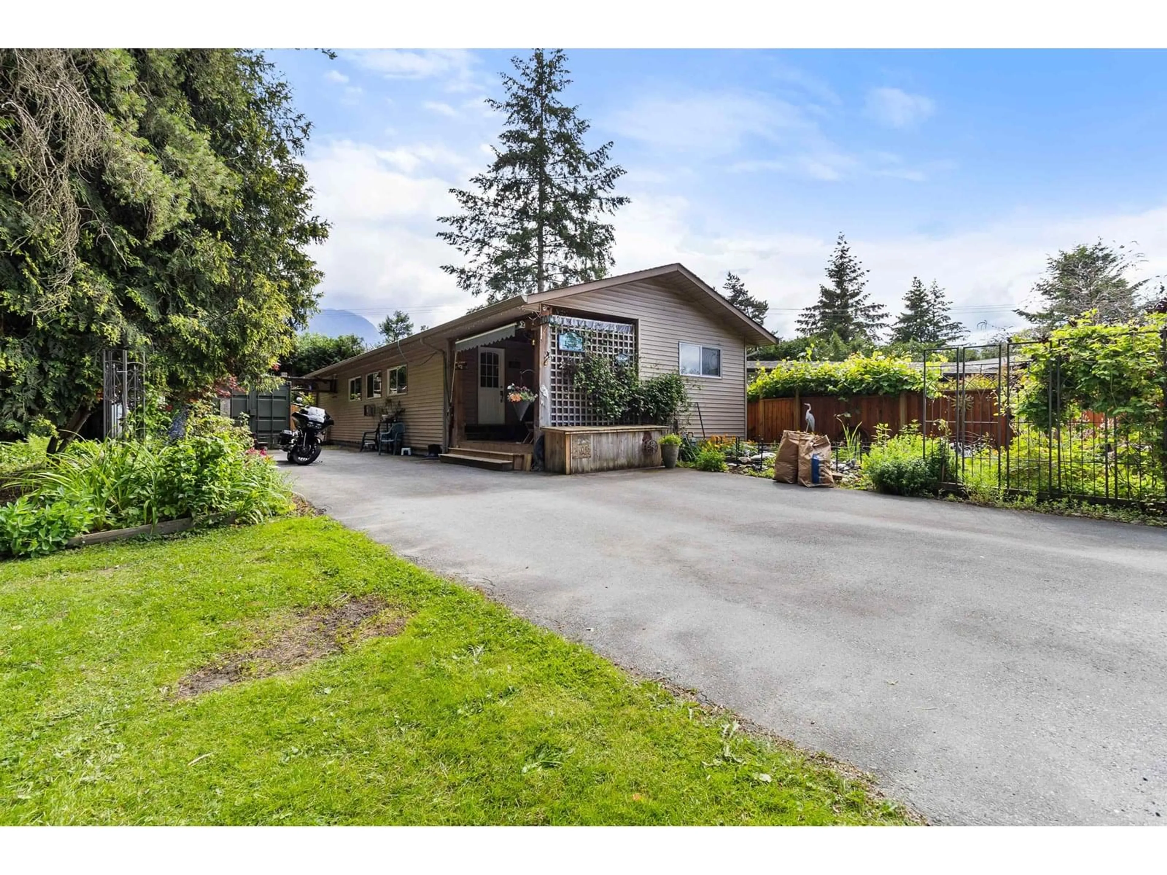A pic from outside/outdoor area/front of a property/back of a property/a pic from drone, street for 107 - 46511 CHILLIWACK LAKE ROAD, Sardis - Chwk River Valley British Columbia V2R3S4