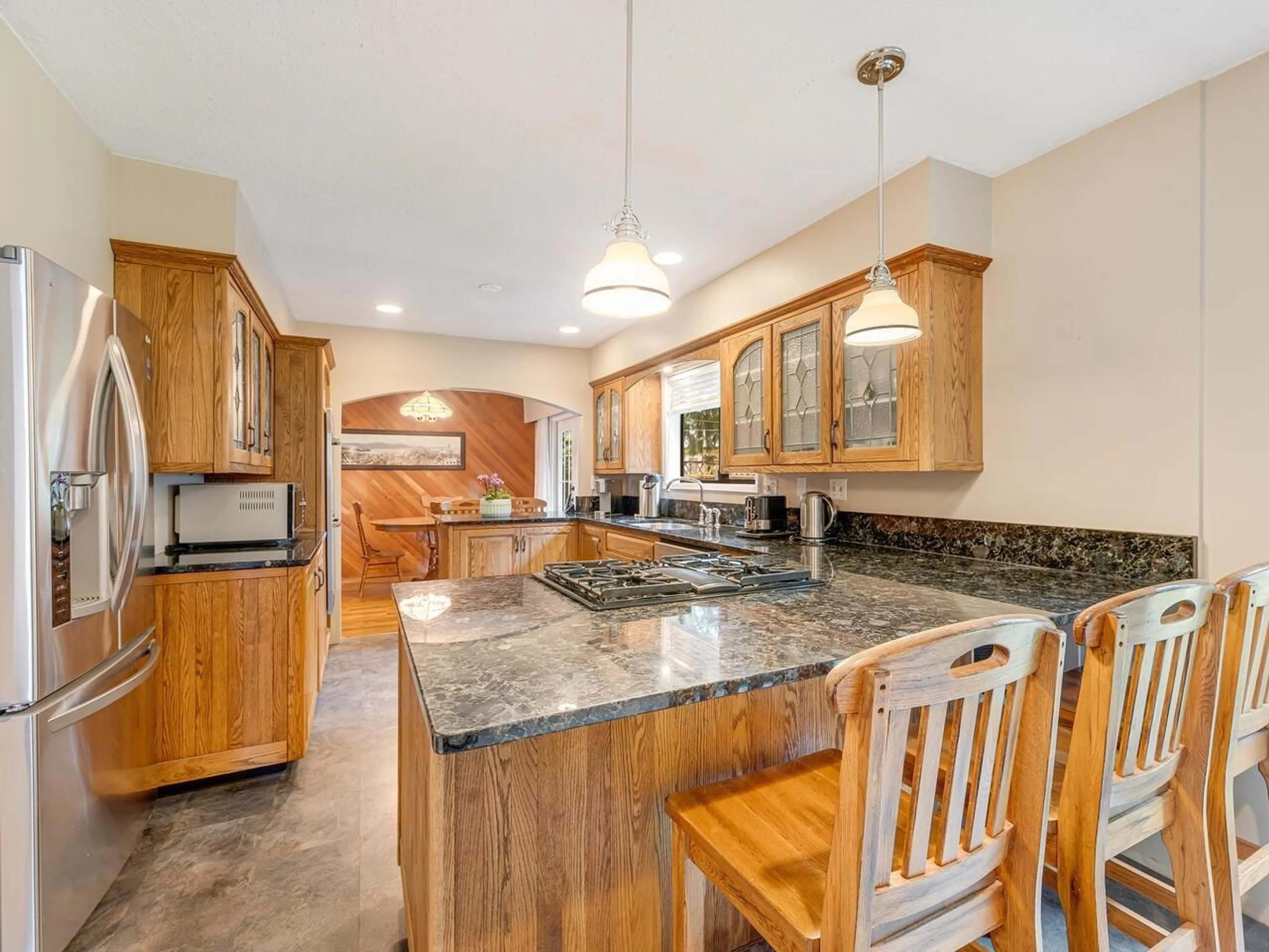 Open concept kitchen, ceramic/tile floor for 9543 OBAN, Surrey British Columbia V3V6Z2