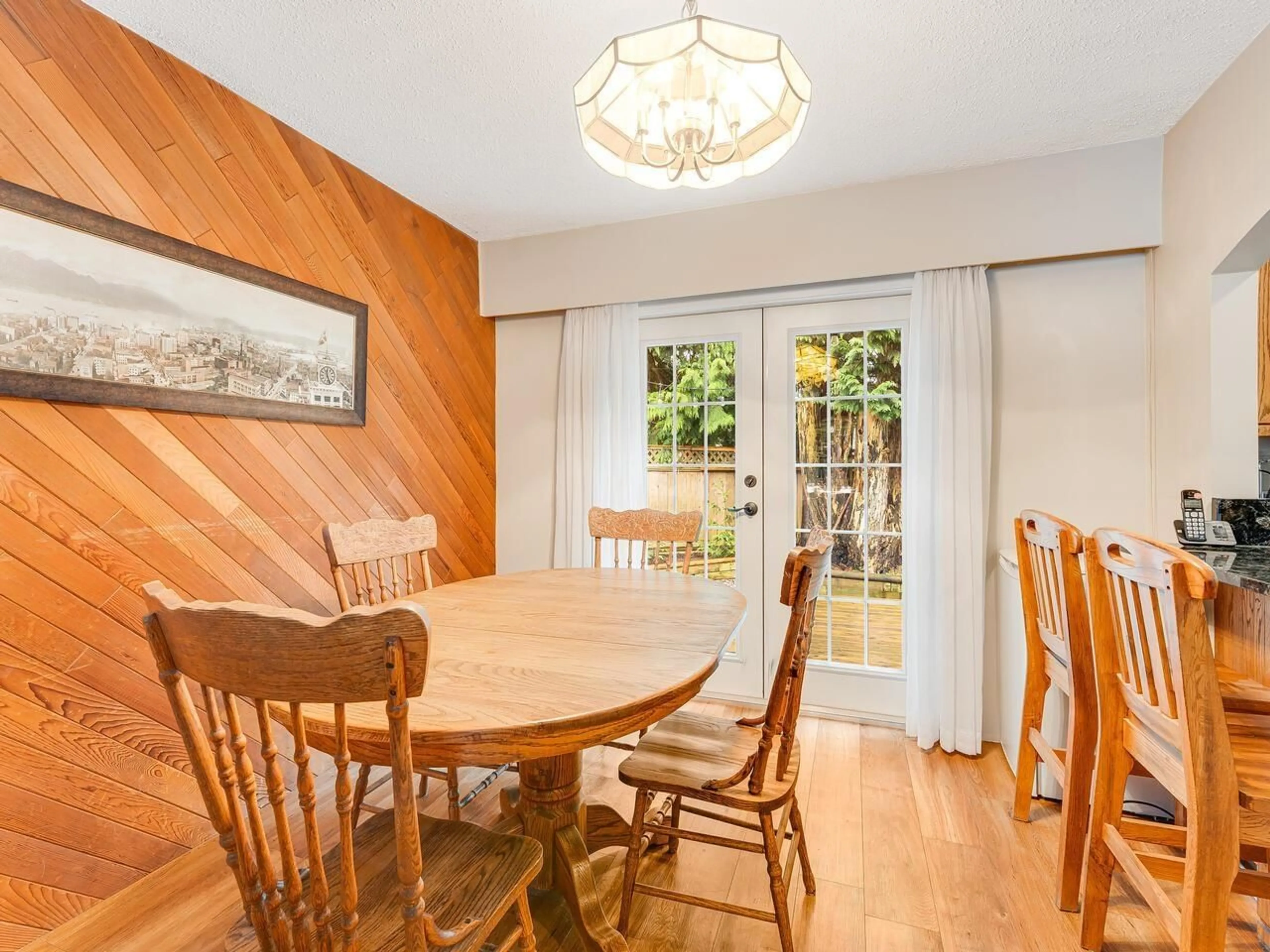 Dining room, wood/laminate floor for 9543 OBAN, Surrey British Columbia V3V6Z2