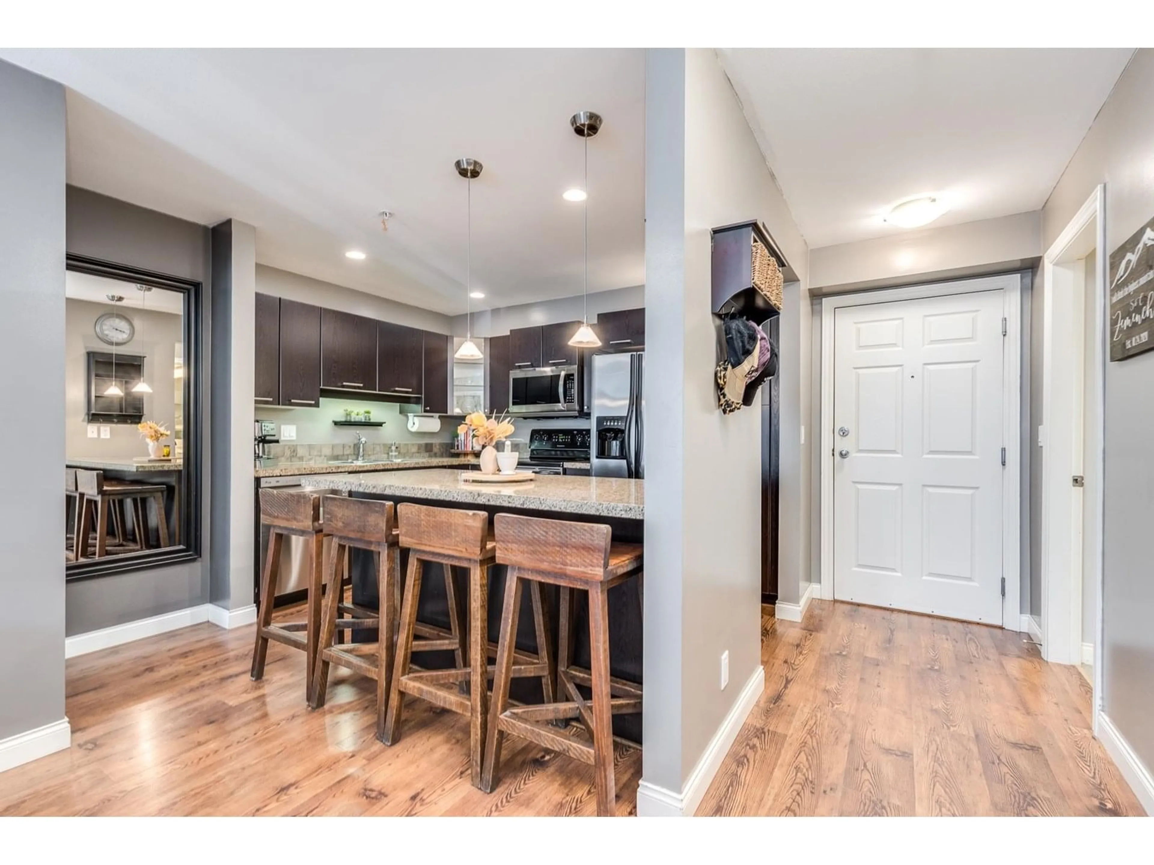 Open concept kitchen, wood/laminate floor for 114 - 5438 198, Langley British Columbia V3A1G2
