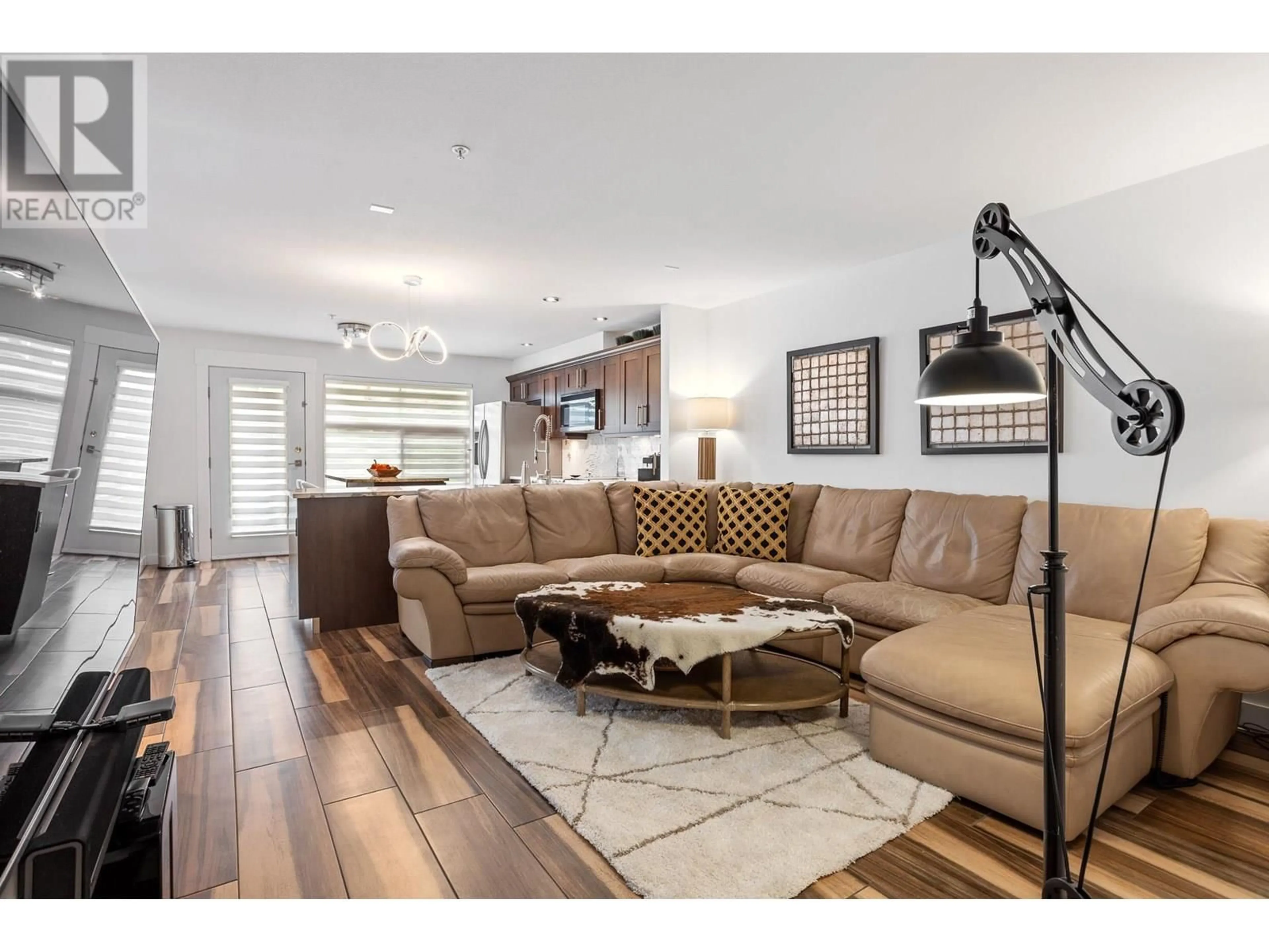 Living room with furniture, wood/laminate floor for 57 - 758 RIVERSIDE DRIVE, Port Coquitlam British Columbia V3B7V8