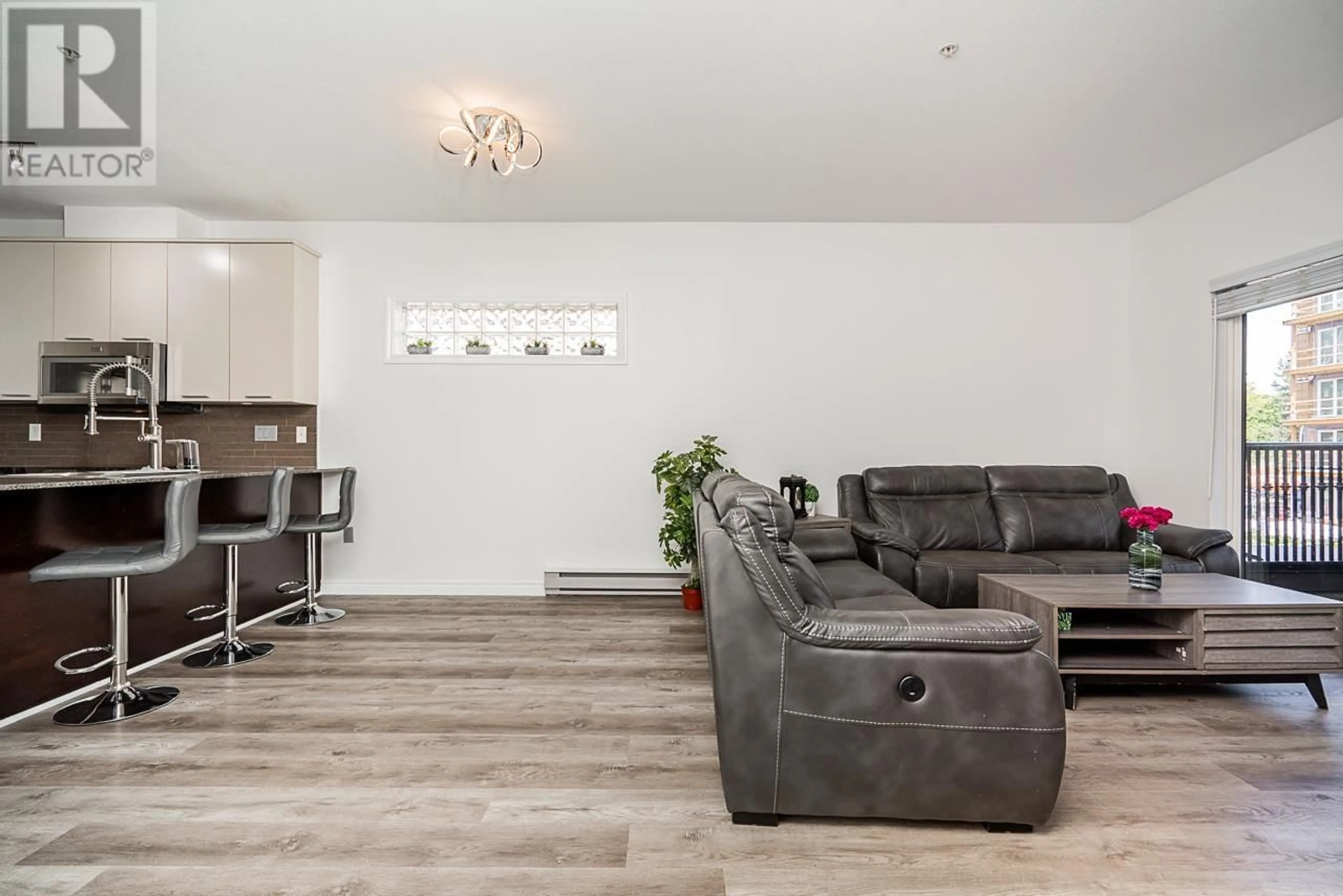 Living room with furniture, wood/laminate floor for 213 - 2478 WELCHER AVENUE, Port Coquitlam British Columbia V3C0A6