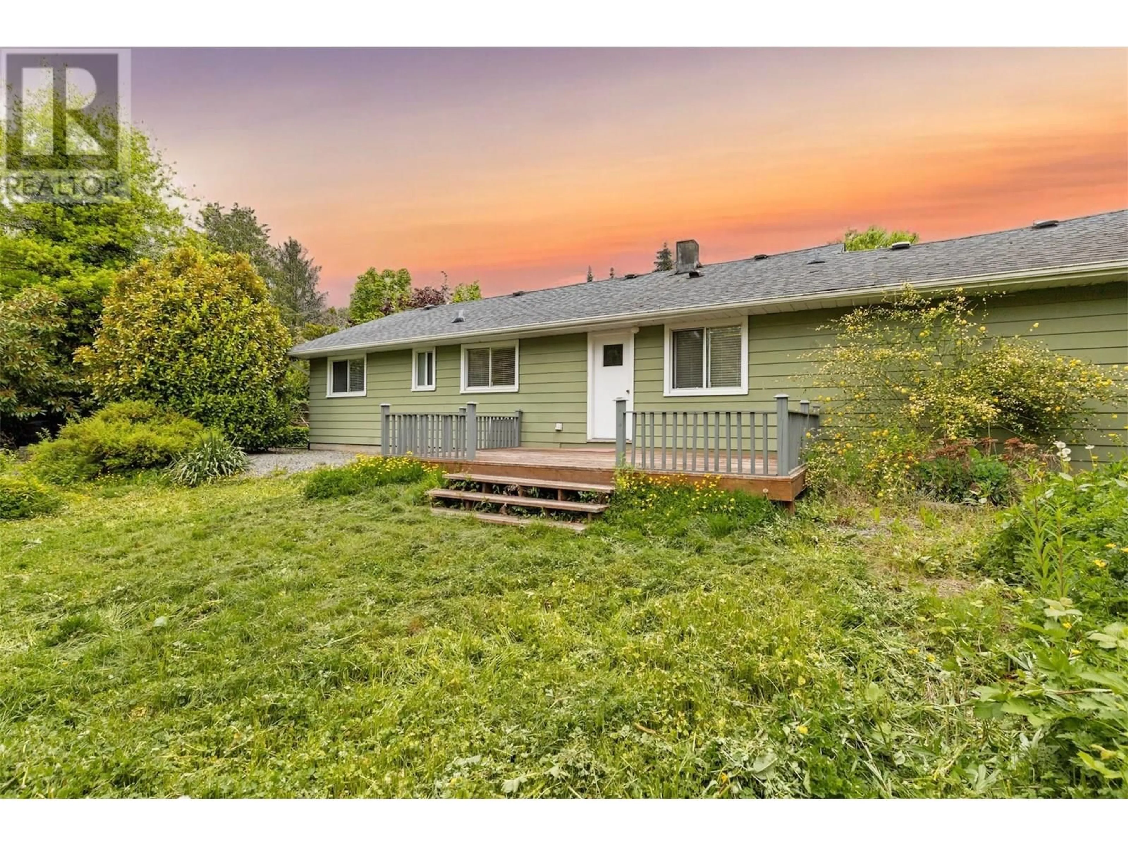 A pic from outside/outdoor area/front of a property/back of a property/a pic from drone, street for 12121 228 STREET, Maple Ridge British Columbia V2X6M2