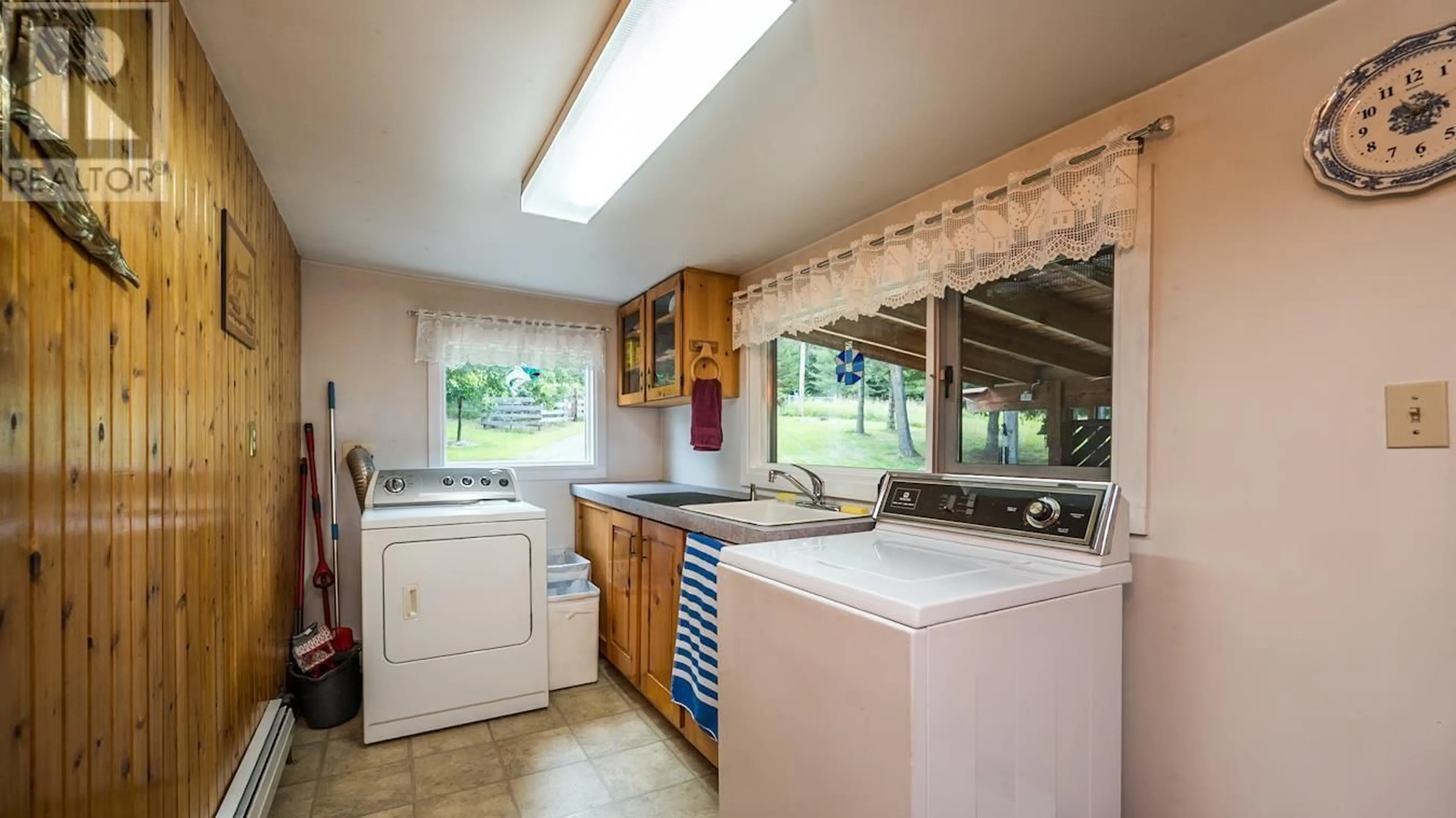 Kitchen with laundary machines, ceramic/tile floor for 28670 RED ROCK ROAD, Red Rock / Stoner British Columbia V2N6A1