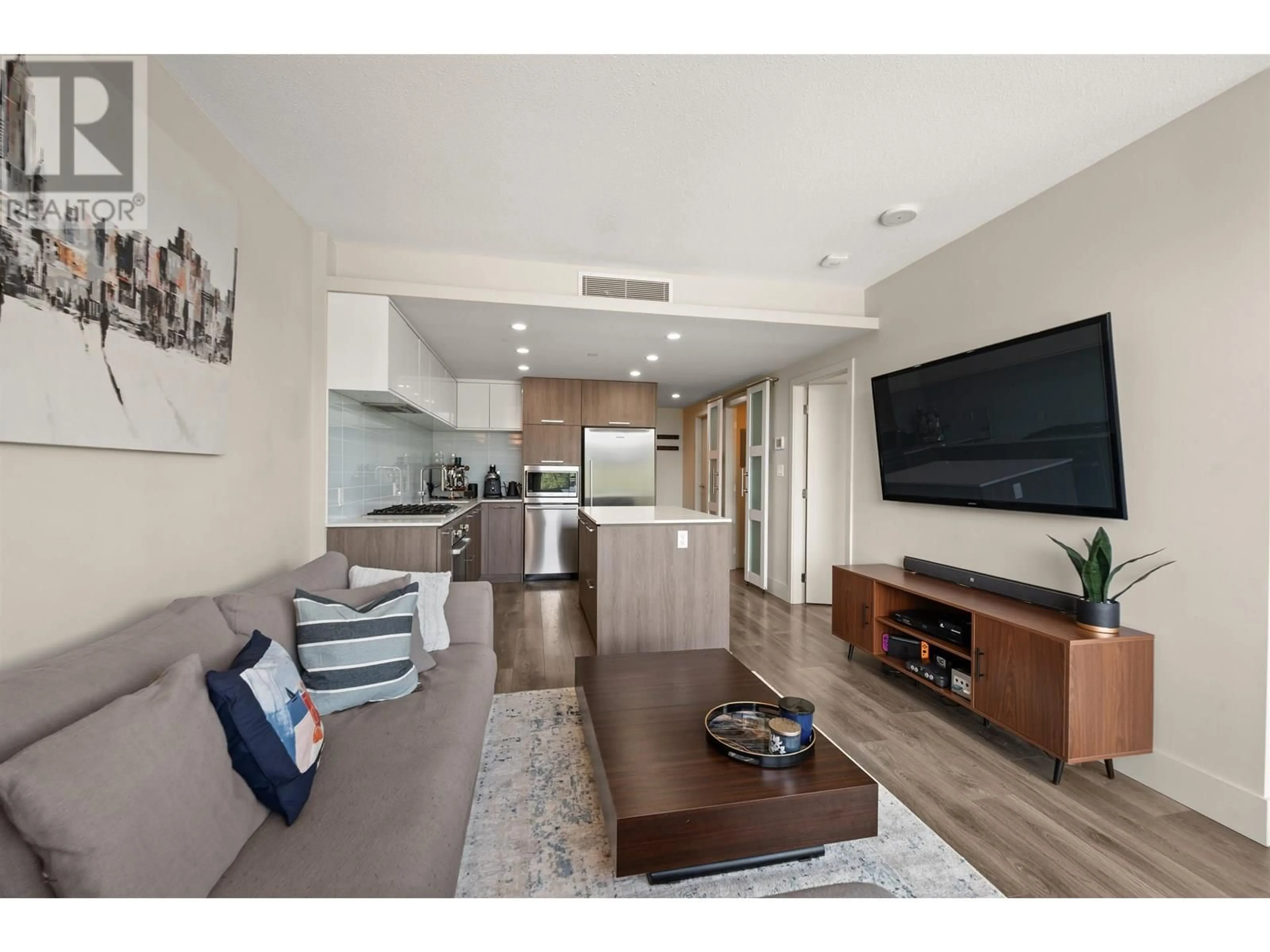 Living room with furniture, wood/laminate floor for 1001 - 680 SEYLYNN CRESCENT, North Vancouver British Columbia V7J0B5