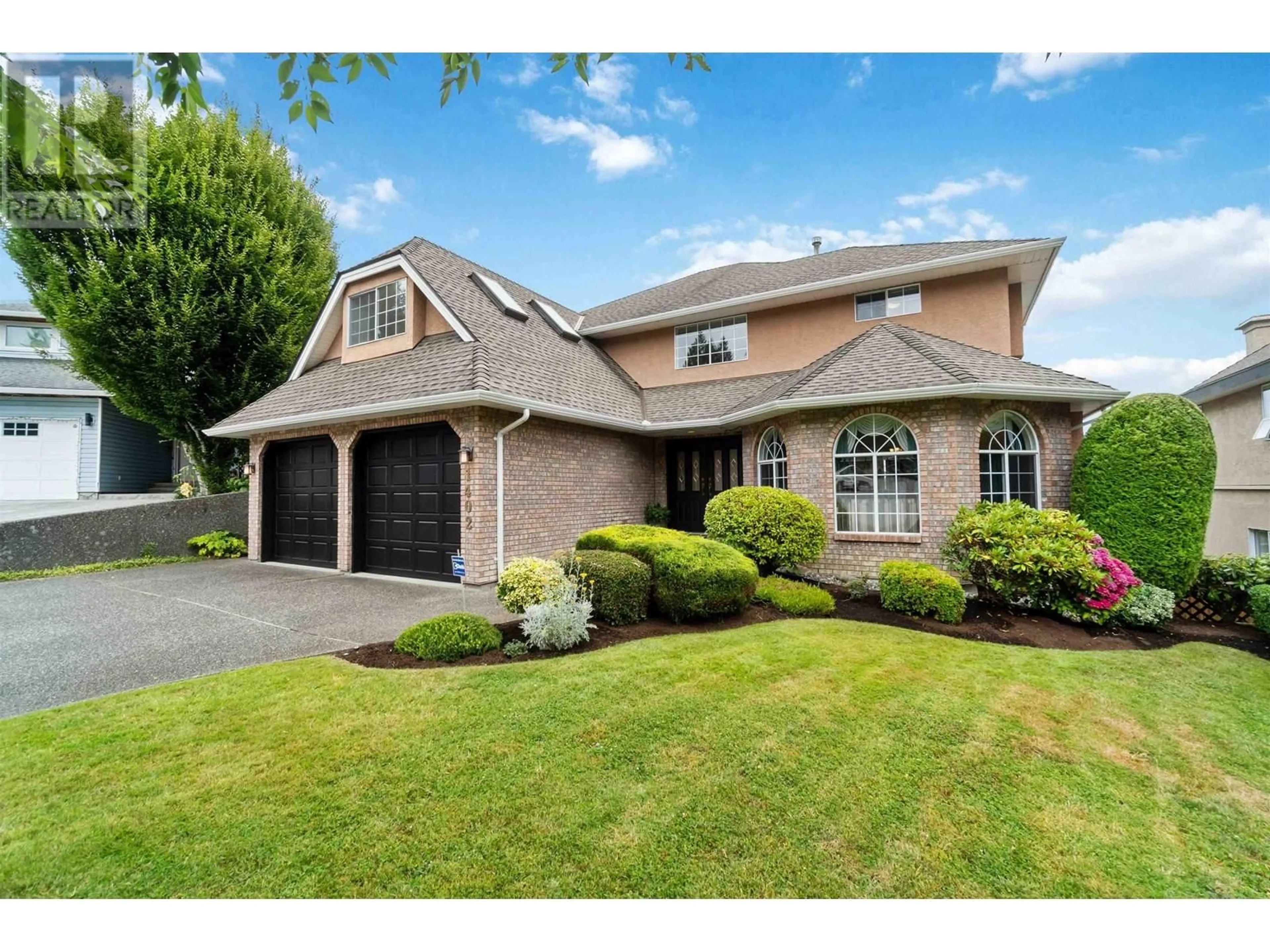 Home with vinyl exterior material, street for 1402 MAGNOLIA PLACE, Coquitlam British Columbia V3H4S8