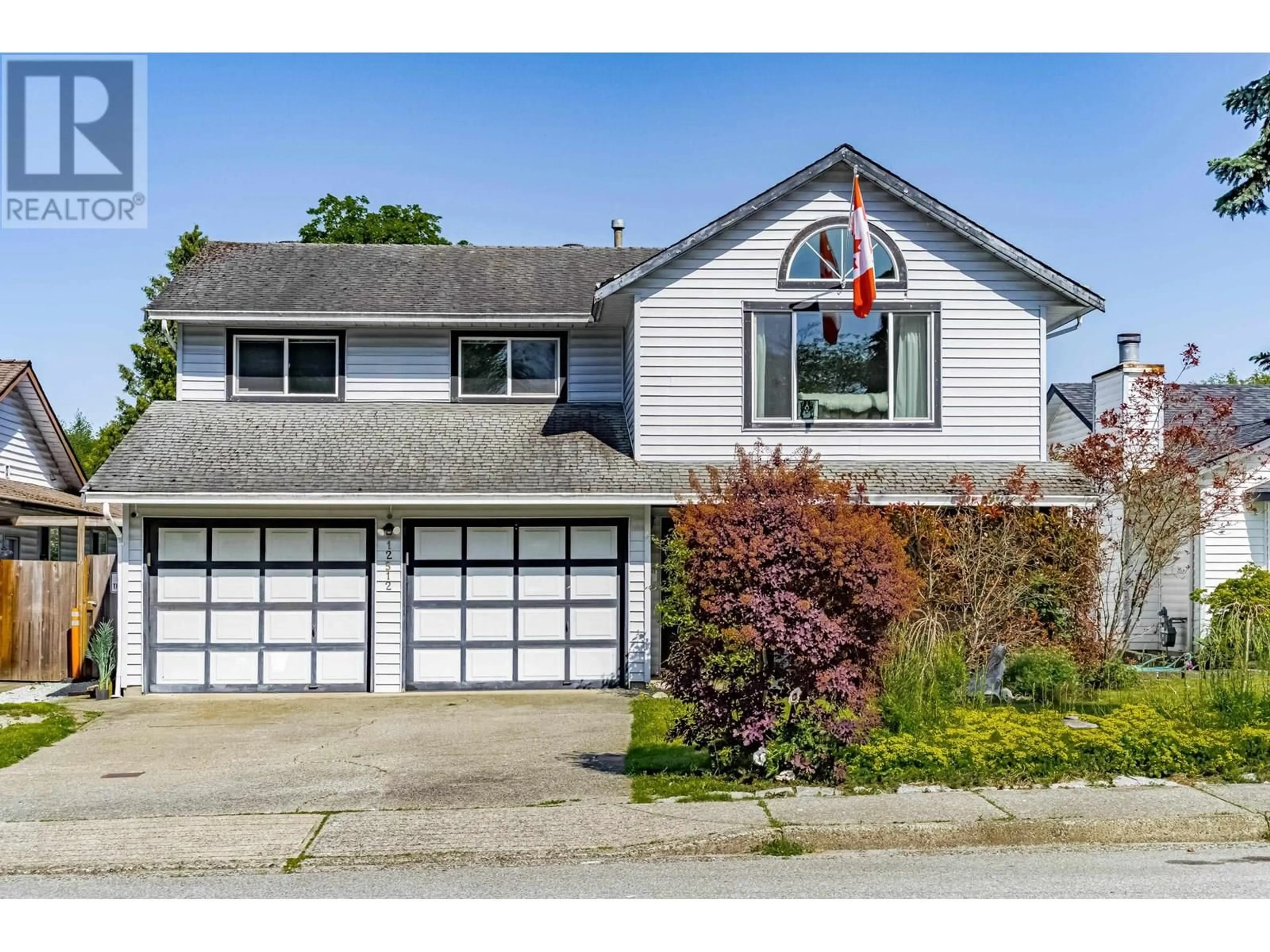 Home with vinyl exterior material, street for 12512 222 STREET, Maple Ridge British Columbia V2X0W5
