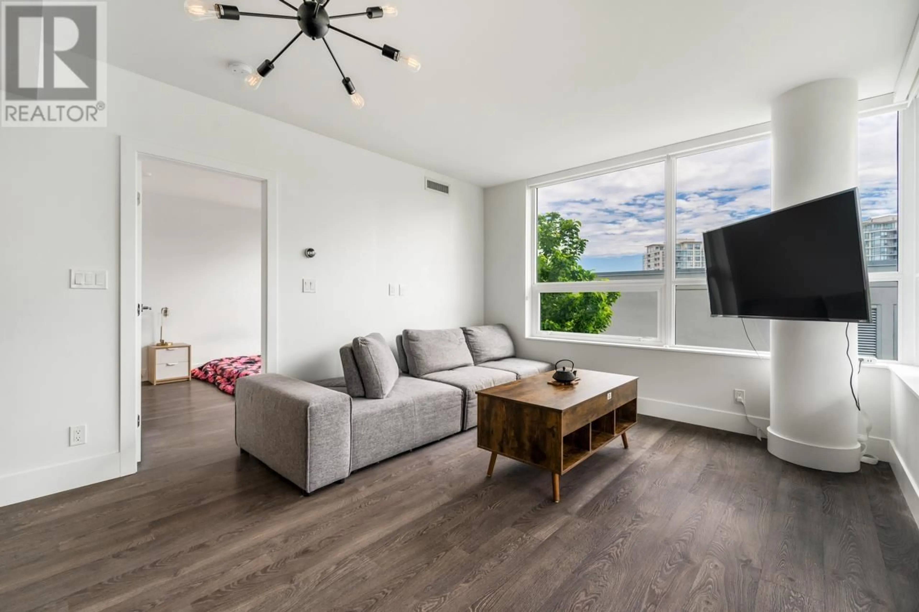 Living room with furniture, wood/laminate floor for 503 - 6900 PEARSON WAY, Richmond British Columbia V7C0C9