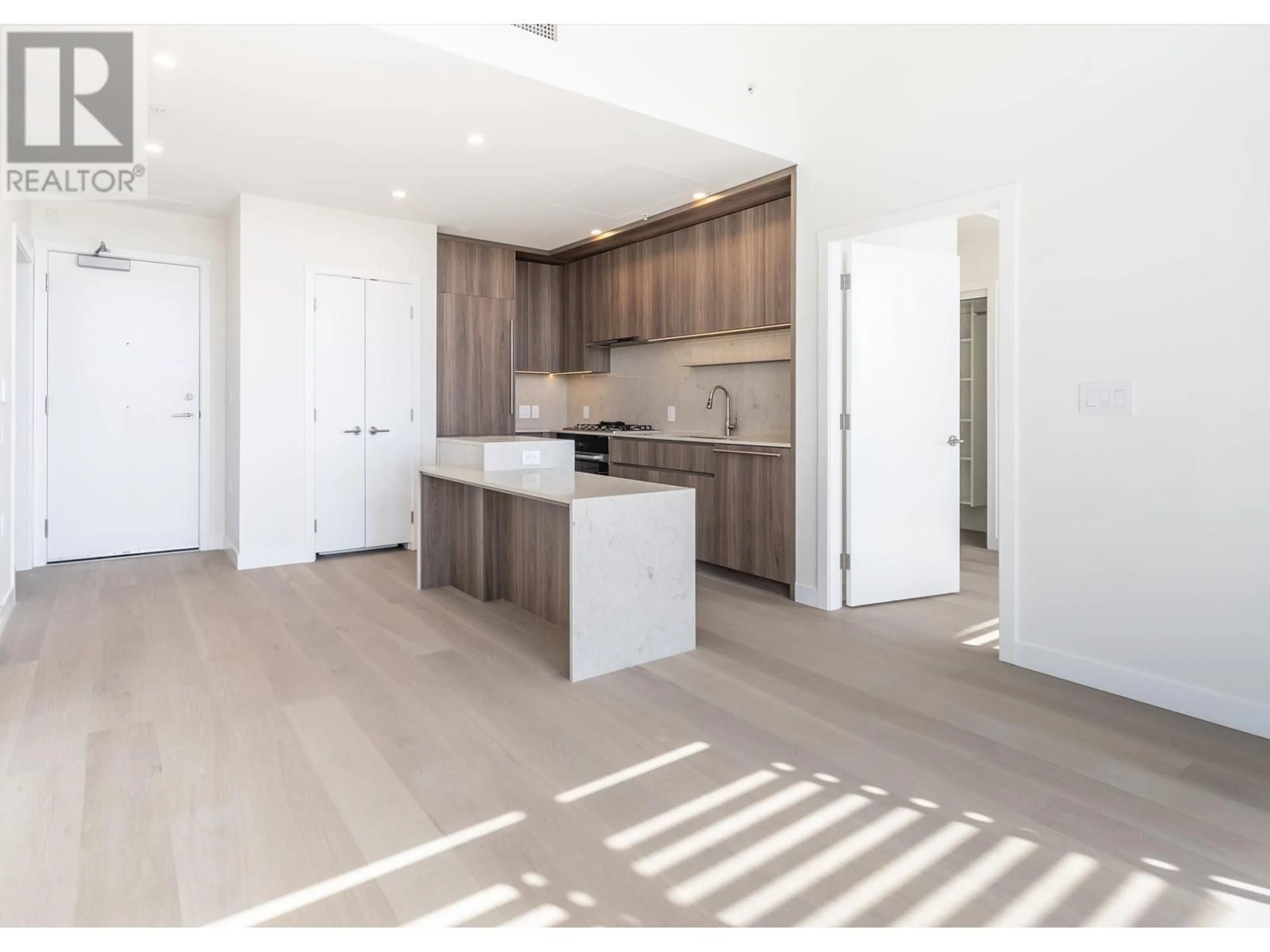 Open concept kitchen, wood/laminate floor for 505 - 5212 CAMBIE STREET, Vancouver British Columbia V5Z2Z7
