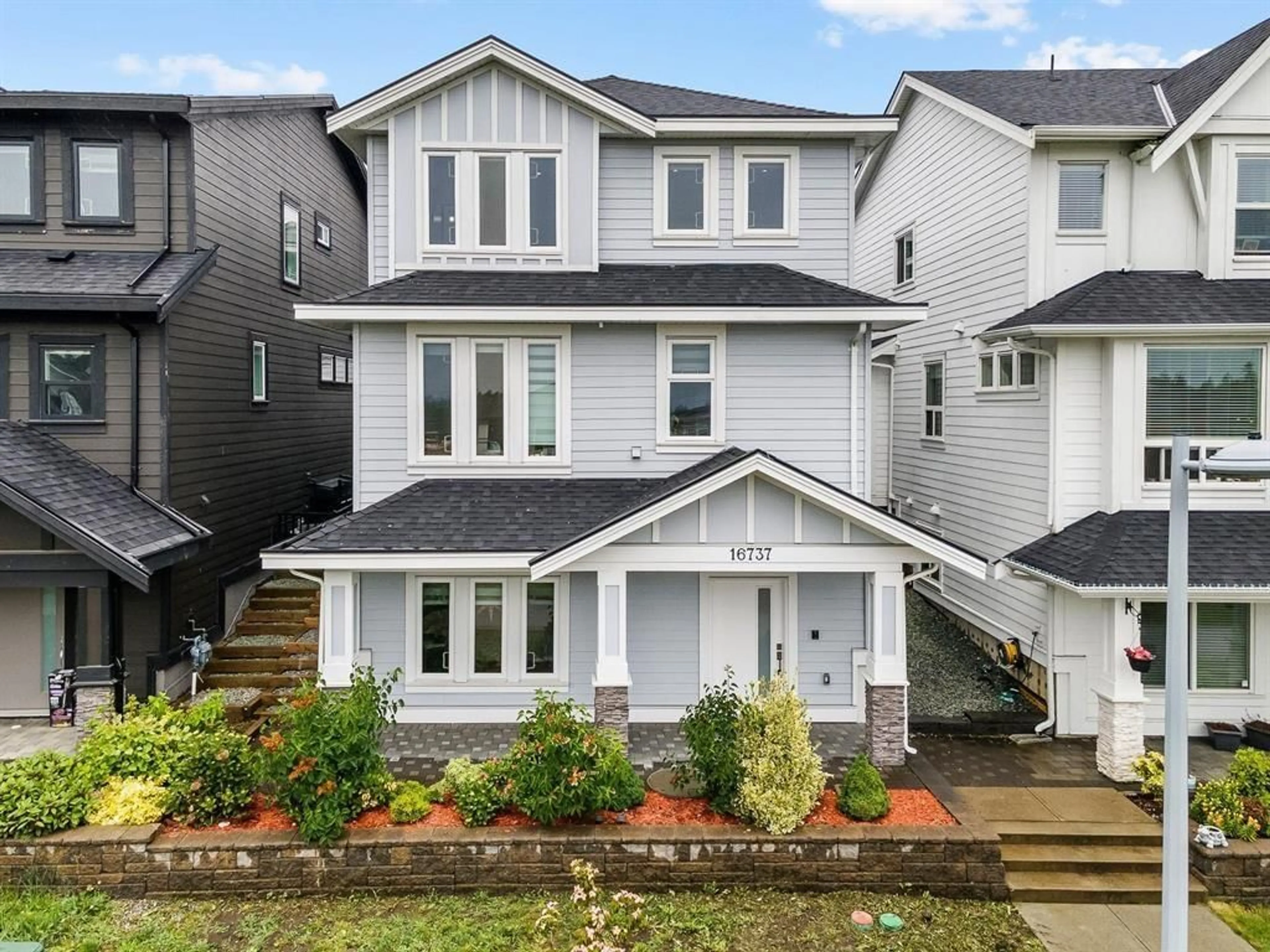 Home with vinyl exterior material, street for 16737 16, Surrey British Columbia V3Z0T3