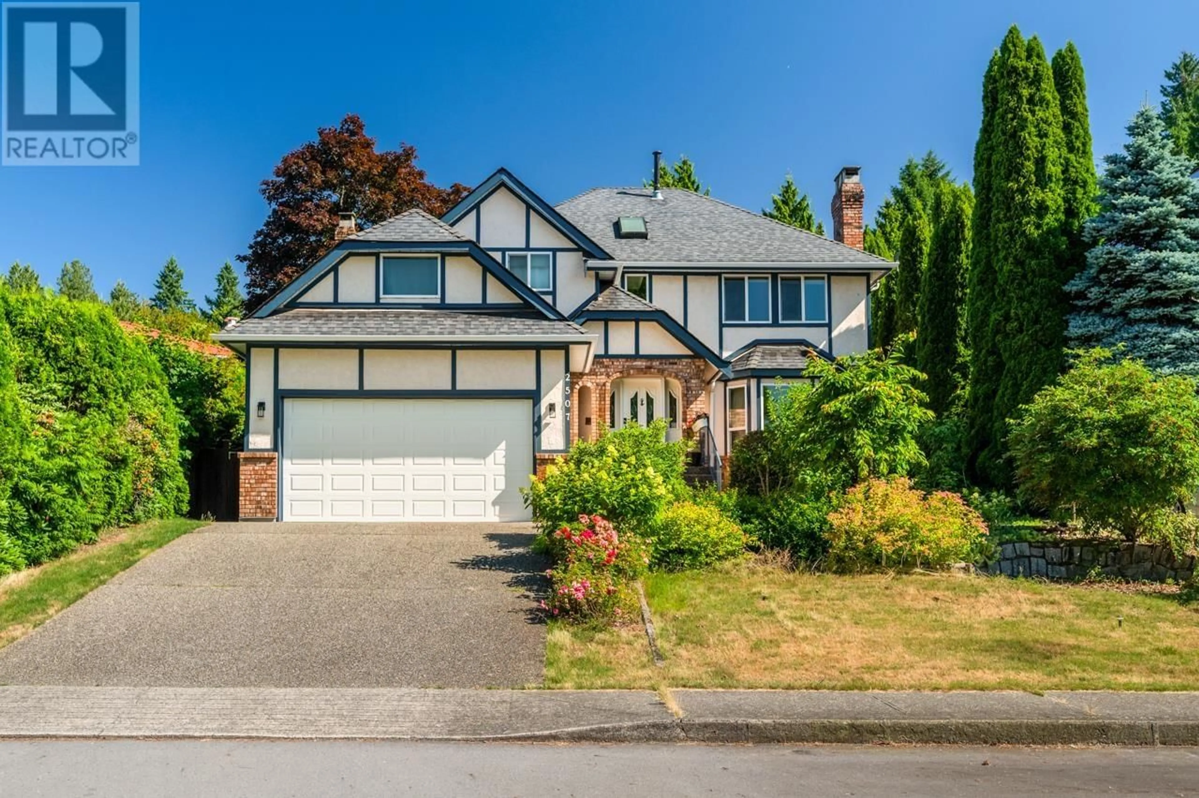 Home with vinyl exterior material, street for 2507 ASHURST AVENUE, Coquitlam British Columbia V3K5T5
