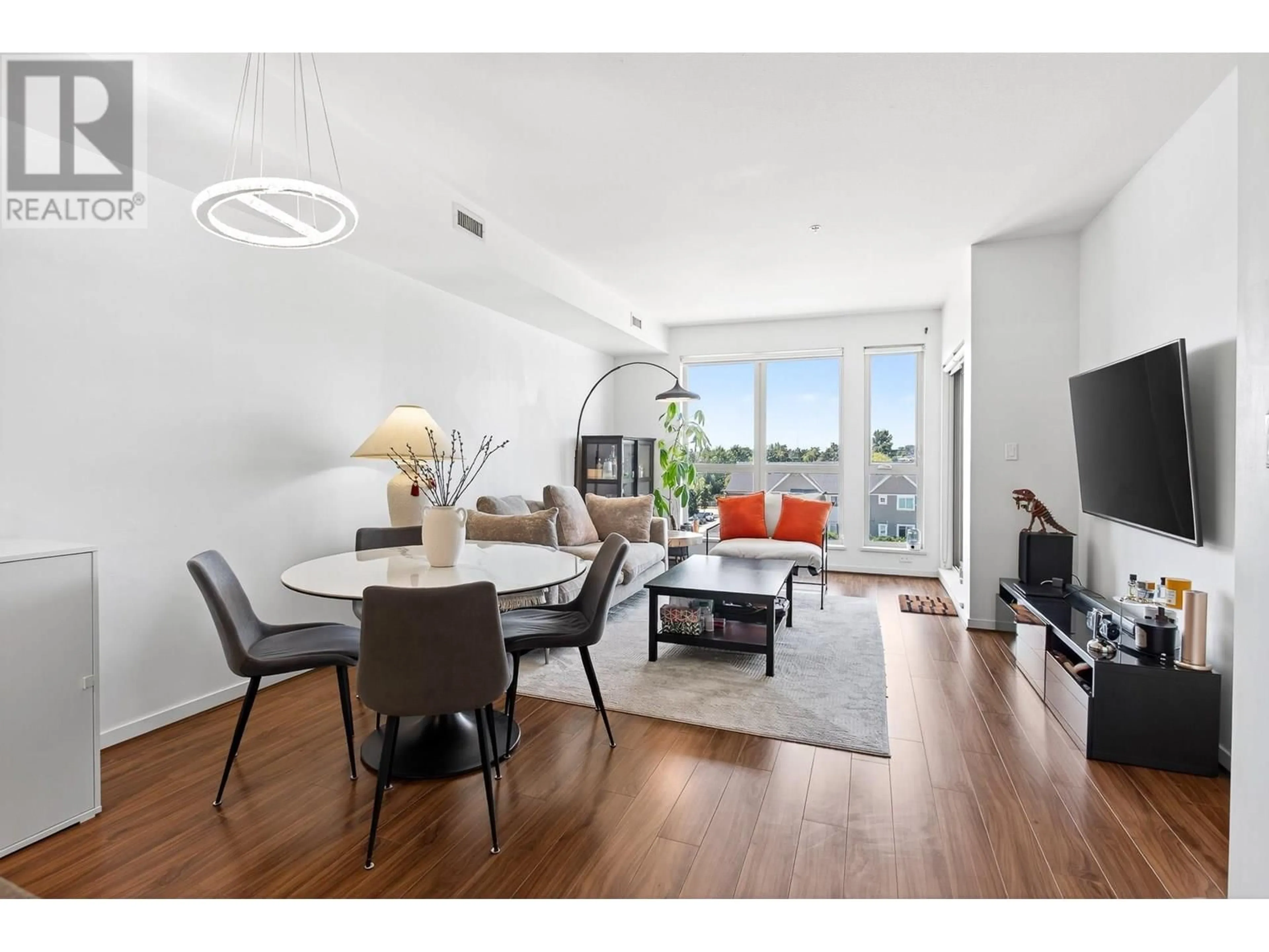 Living room with furniture, wood/laminate floor for 562 - 4099 STOLBERG STREET, Richmond British Columbia V6X0J4