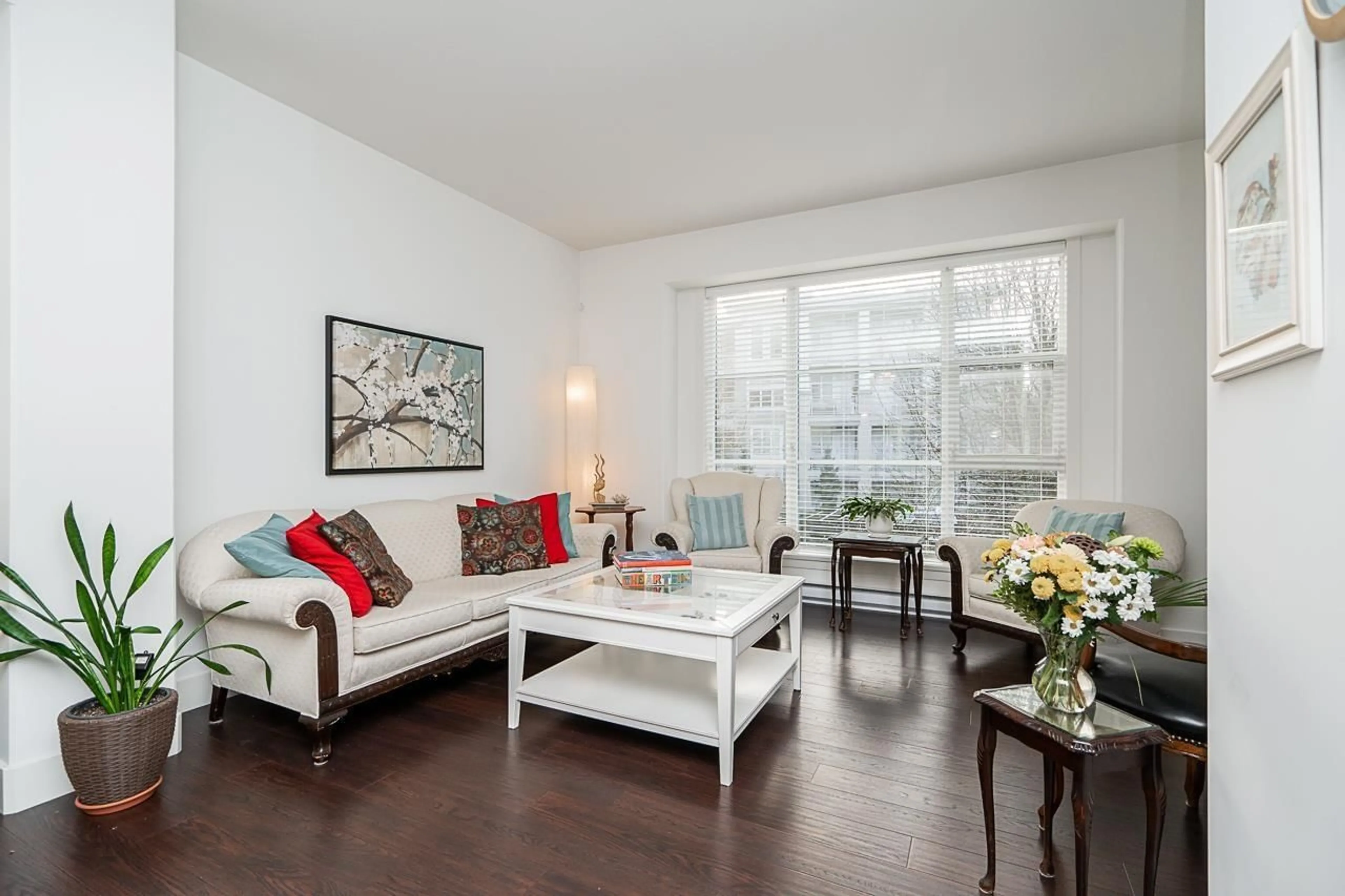 Living room with furniture, wood/laminate floor for 15 - 15405 31, Surrey British Columbia V3Z2W5