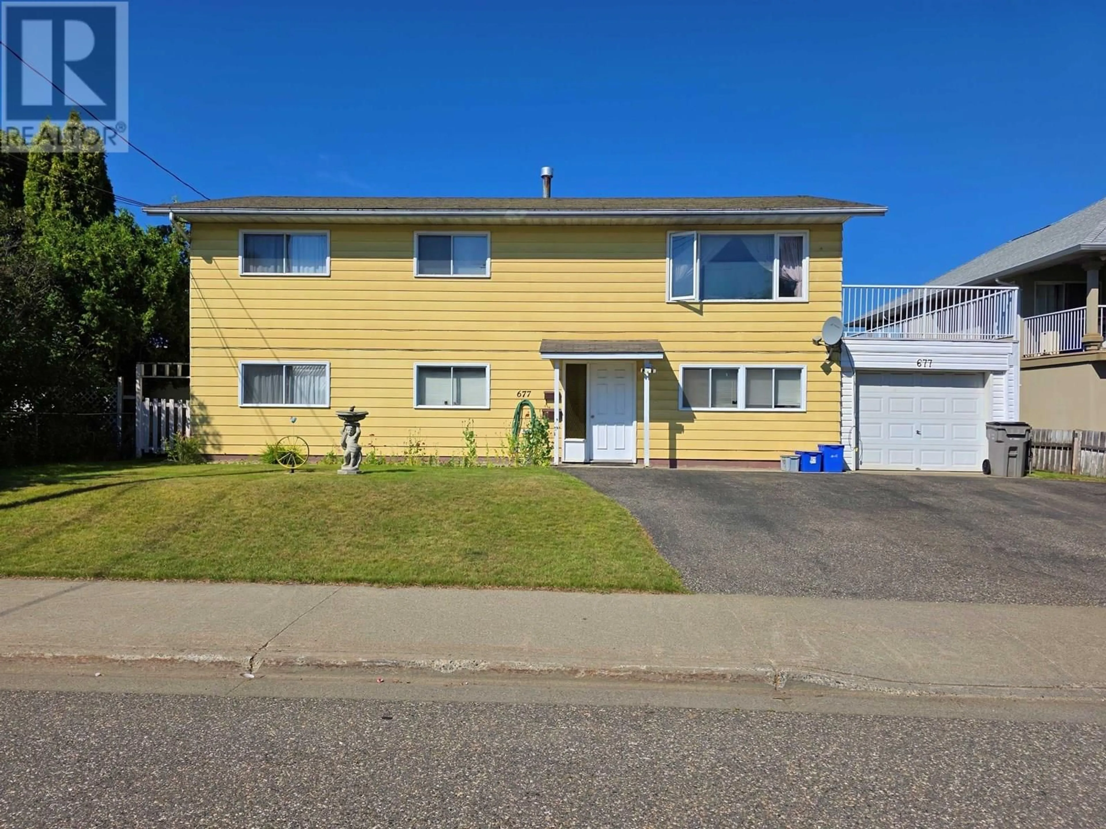 Home with vinyl exterior material, street for 677 REID STREET, Quesnel British Columbia V2J2N2