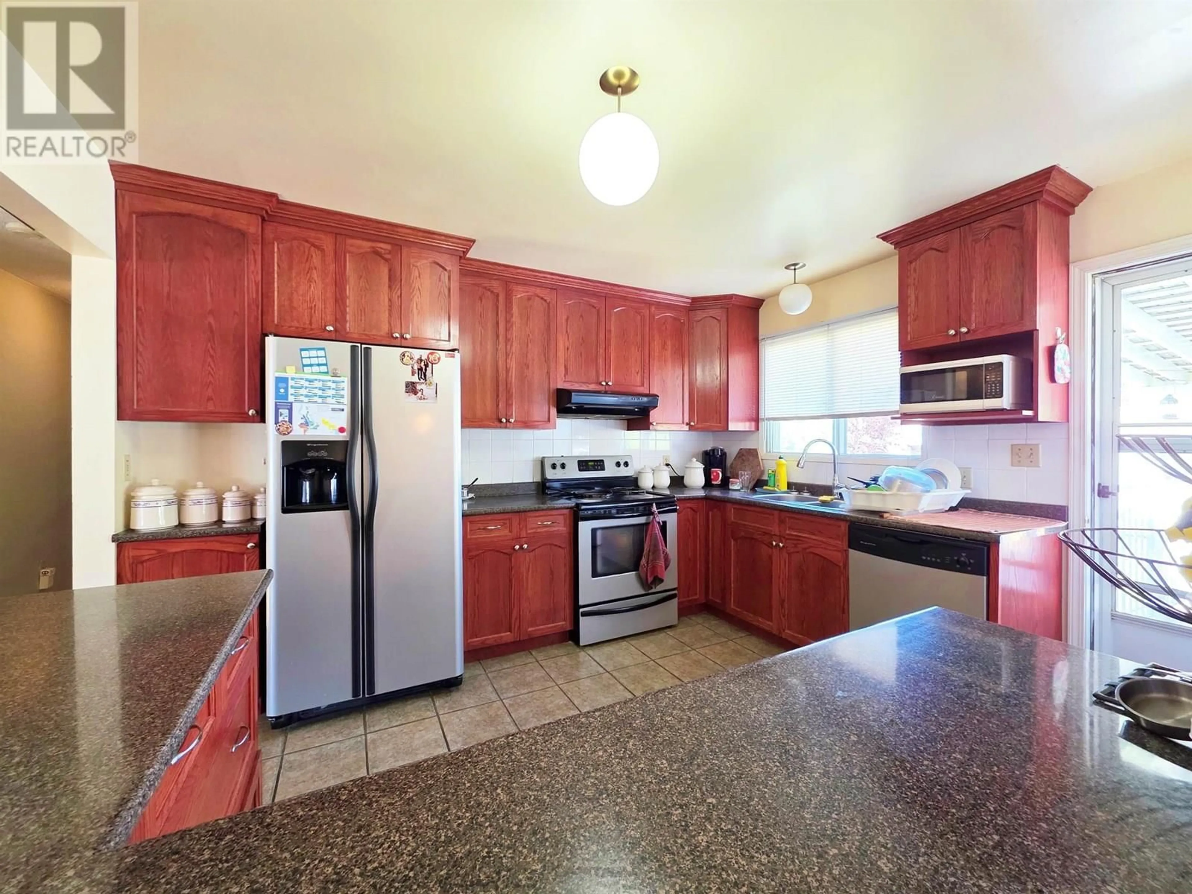 Standard kitchen, ceramic/tile floor for 677 REID STREET, Quesnel British Columbia V2J2N2