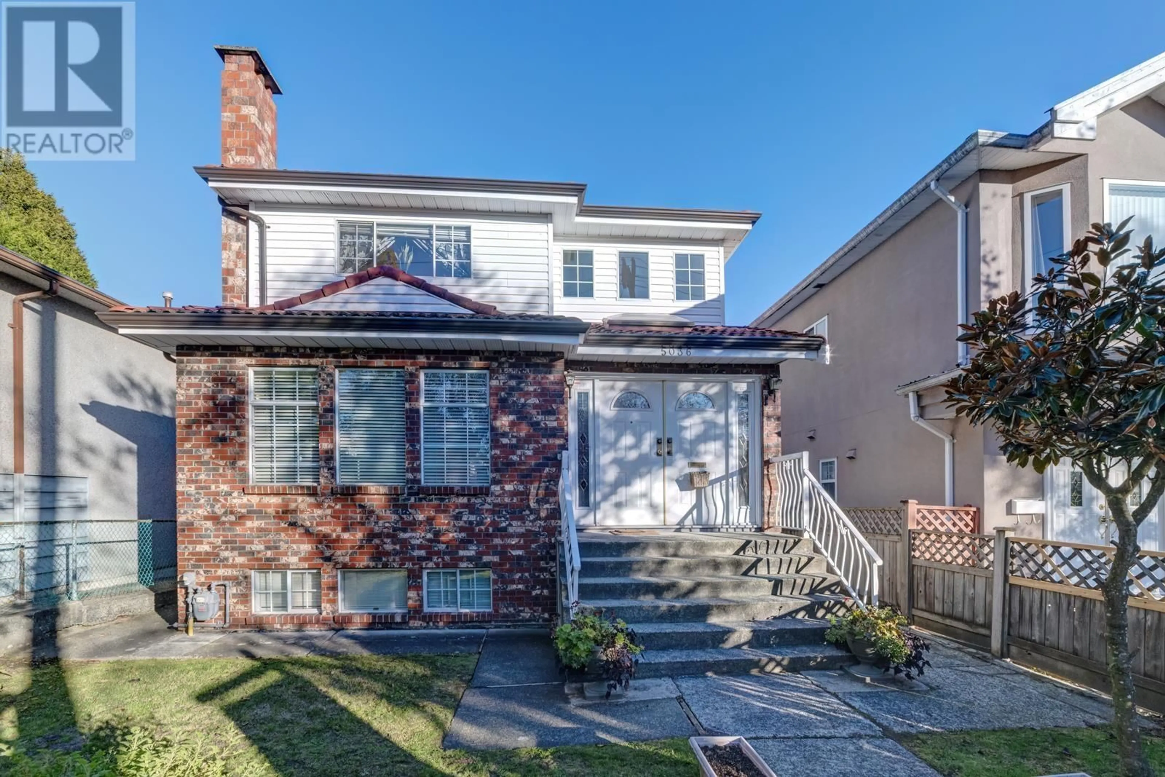 Home with brick exterior material, street for 5036 GLADSTONE STREET, Vancouver British Columbia V5P4B9