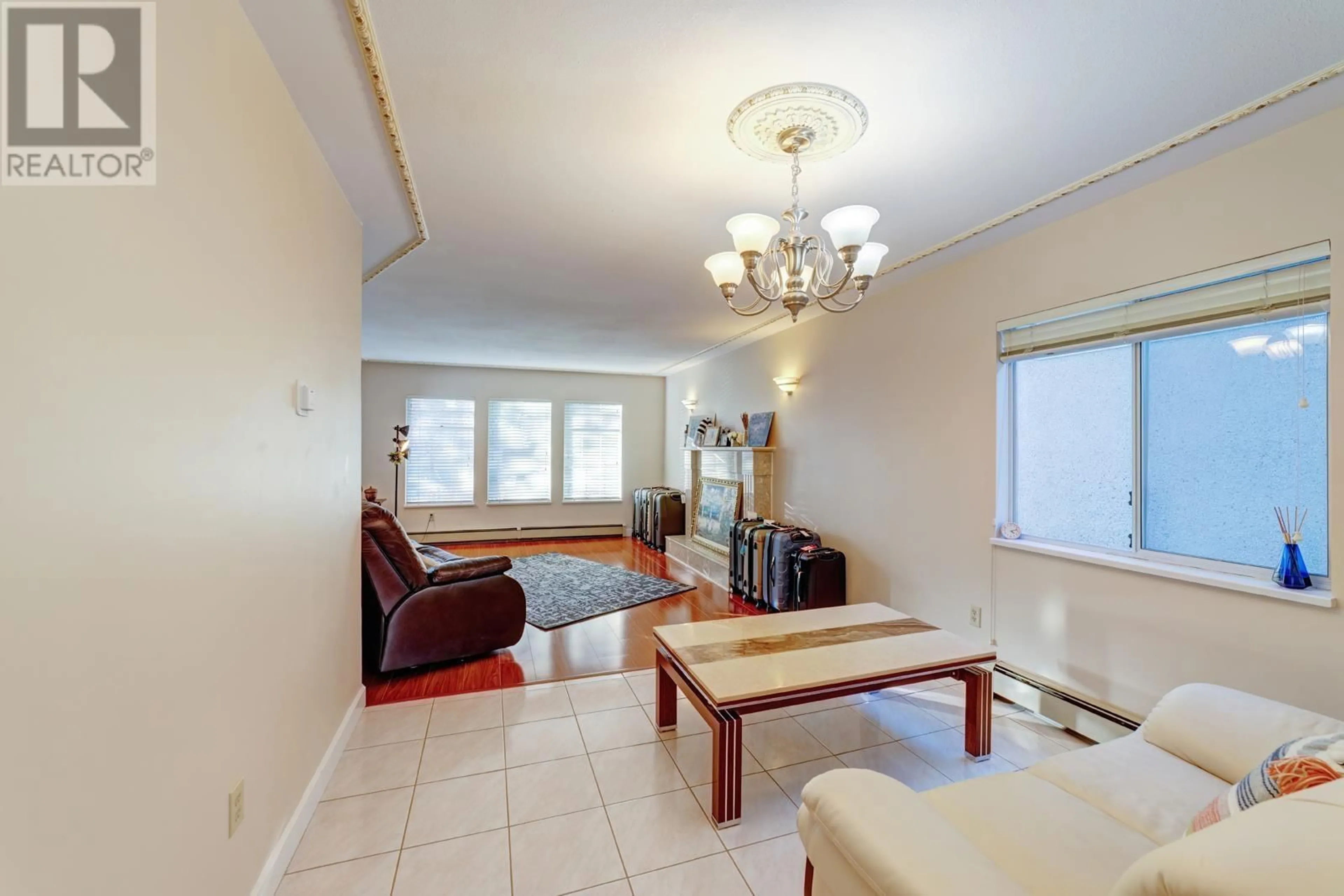 Living room with furniture, unknown for 5036 GLADSTONE STREET, Vancouver British Columbia V5P4B9