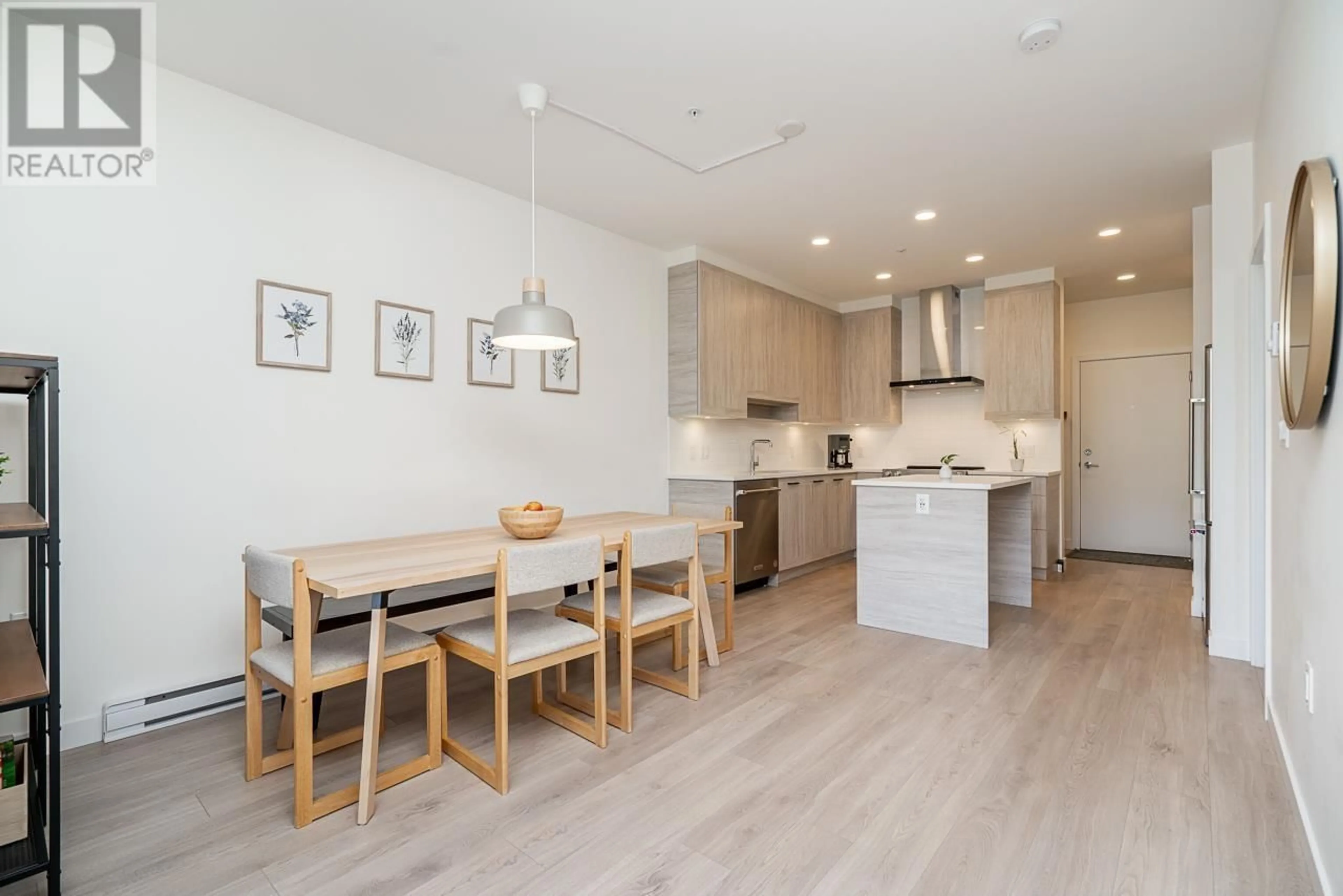 Open concept kitchen, wood/laminate floor for 213 - 7579 16TH STREET, Burnaby British Columbia V3N0H7