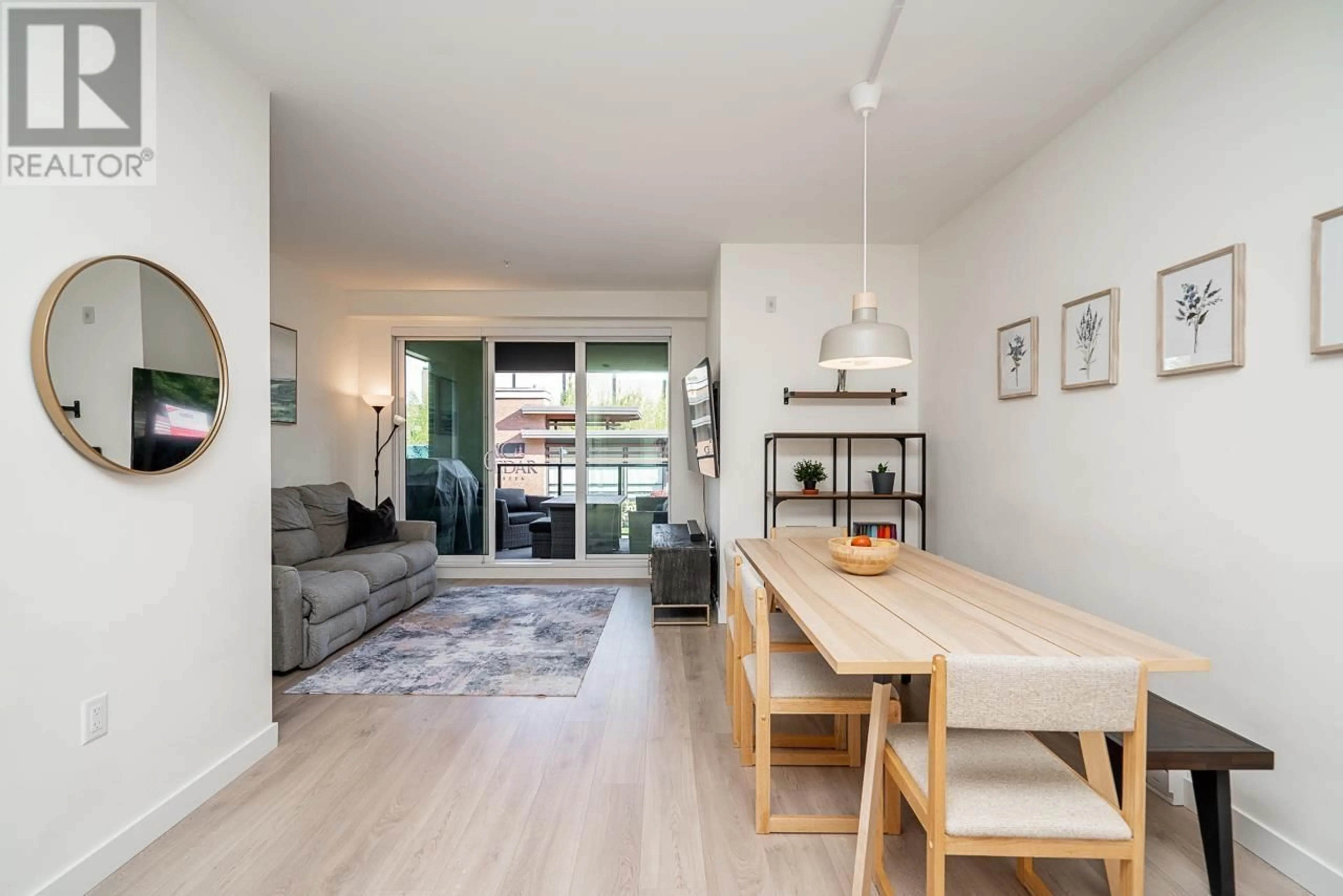 Living room with furniture, wood/laminate floor for 213 - 7579 16TH STREET, Burnaby British Columbia V3N0H7