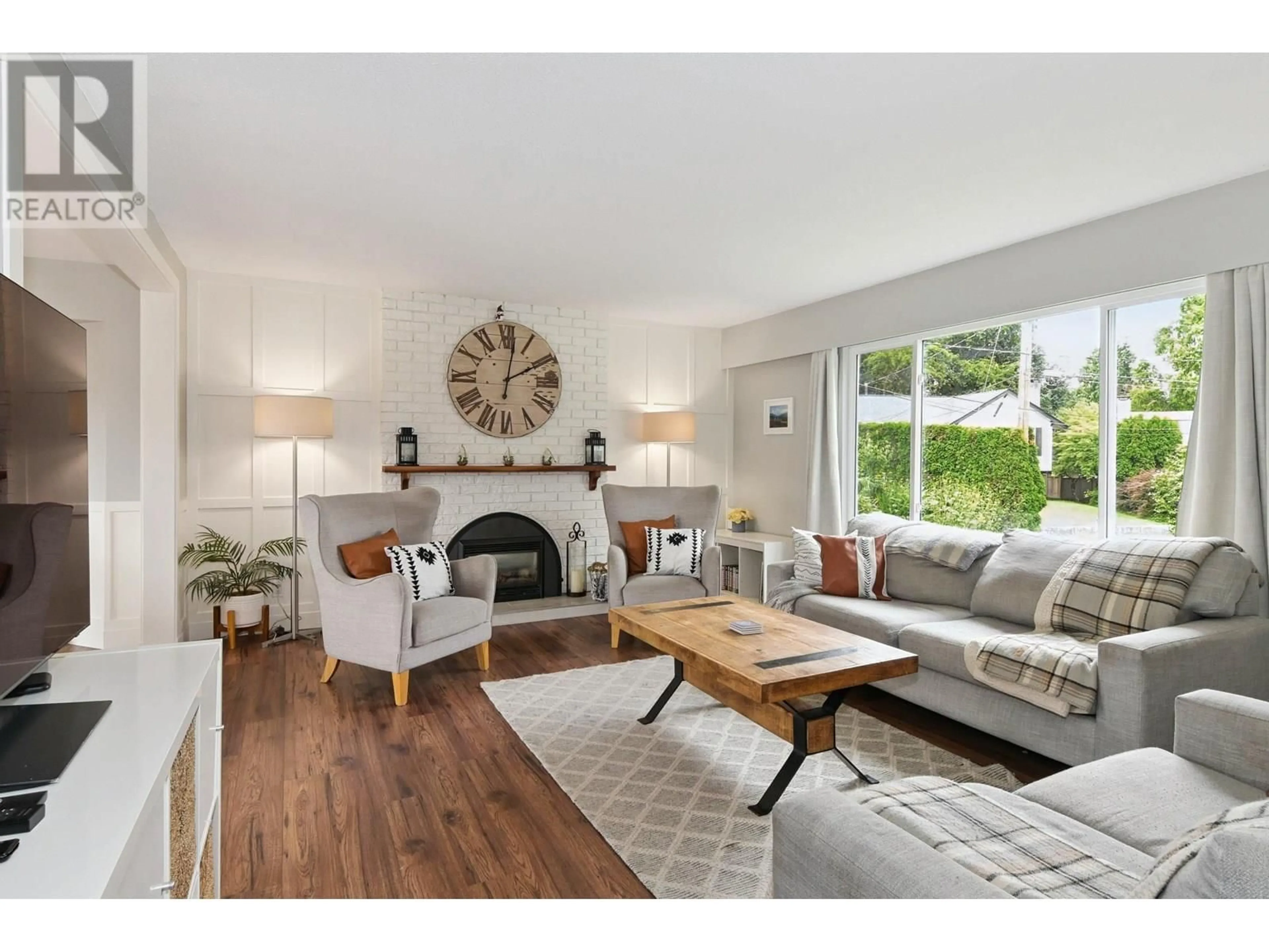 Living room with furniture, wood/laminate floor for 1850 SINCLAIR PLACE, Port Coquitlam British Columbia V3C1B1
