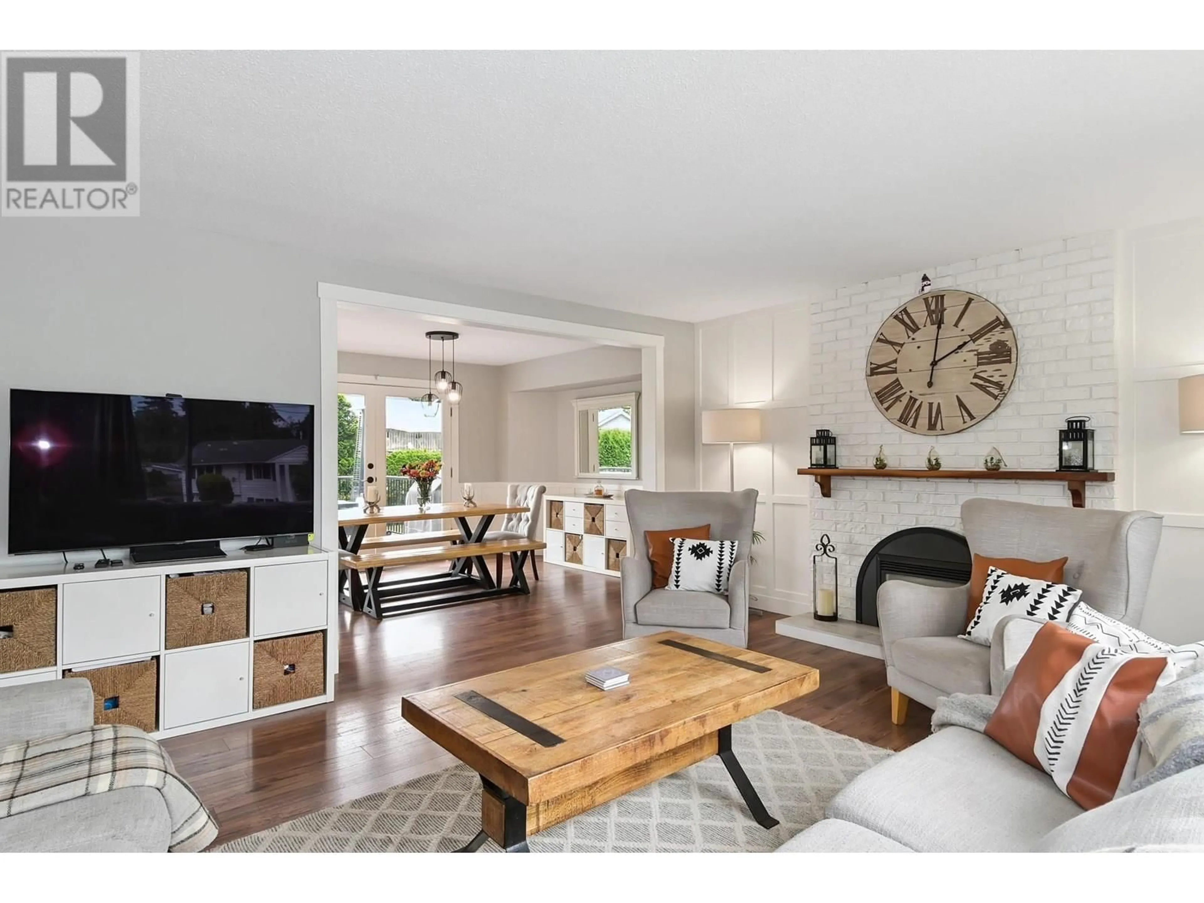 Living room with furniture, wood/laminate floor for 1850 SINCLAIR PLACE, Port Coquitlam British Columbia V3C1B1
