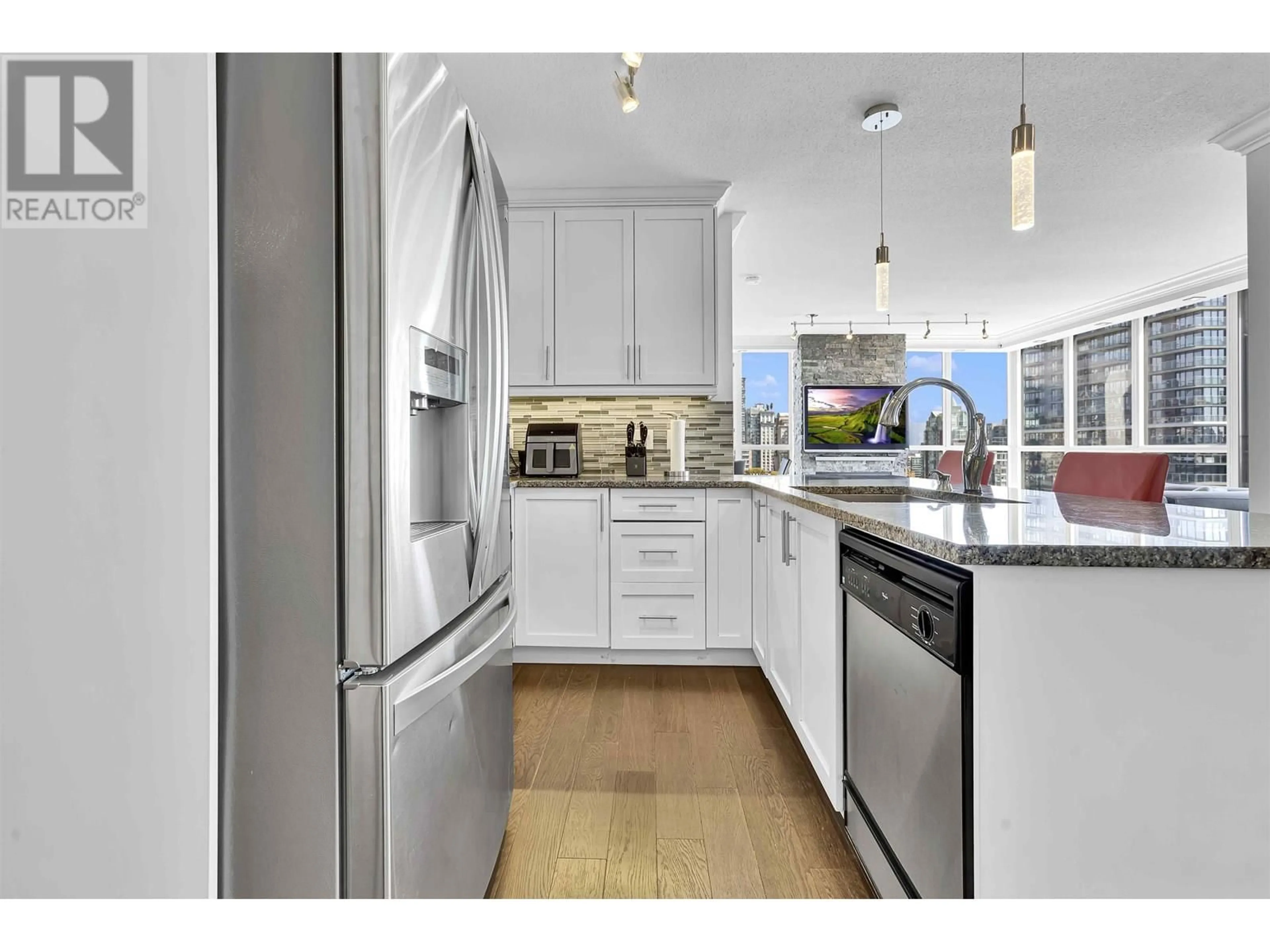 Open concept kitchen, unknown for "2404" - 1199 SEYMOUR STREET, Vancouver British Columbia V6B1K3