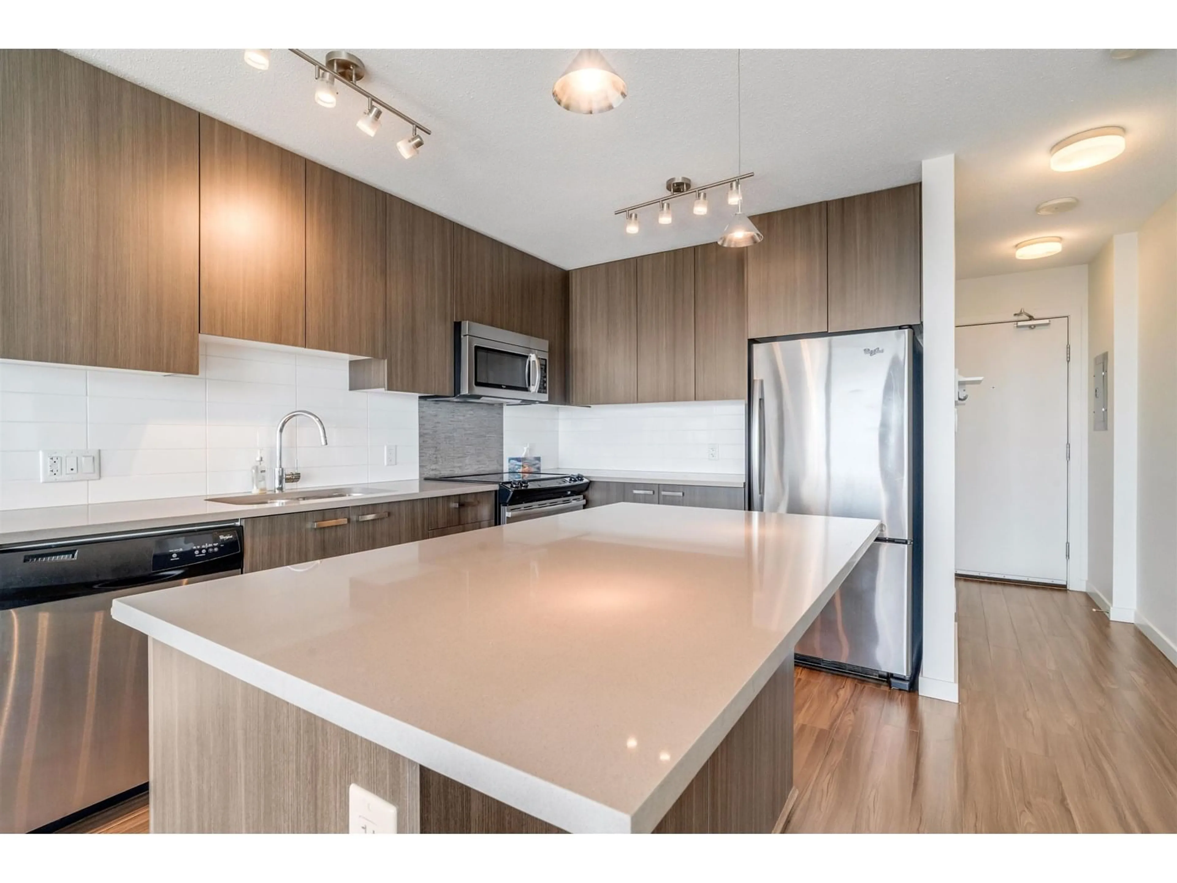 Open concept kitchen, unknown for 3707 - 13325 102A, Surrey British Columbia V3T1P6