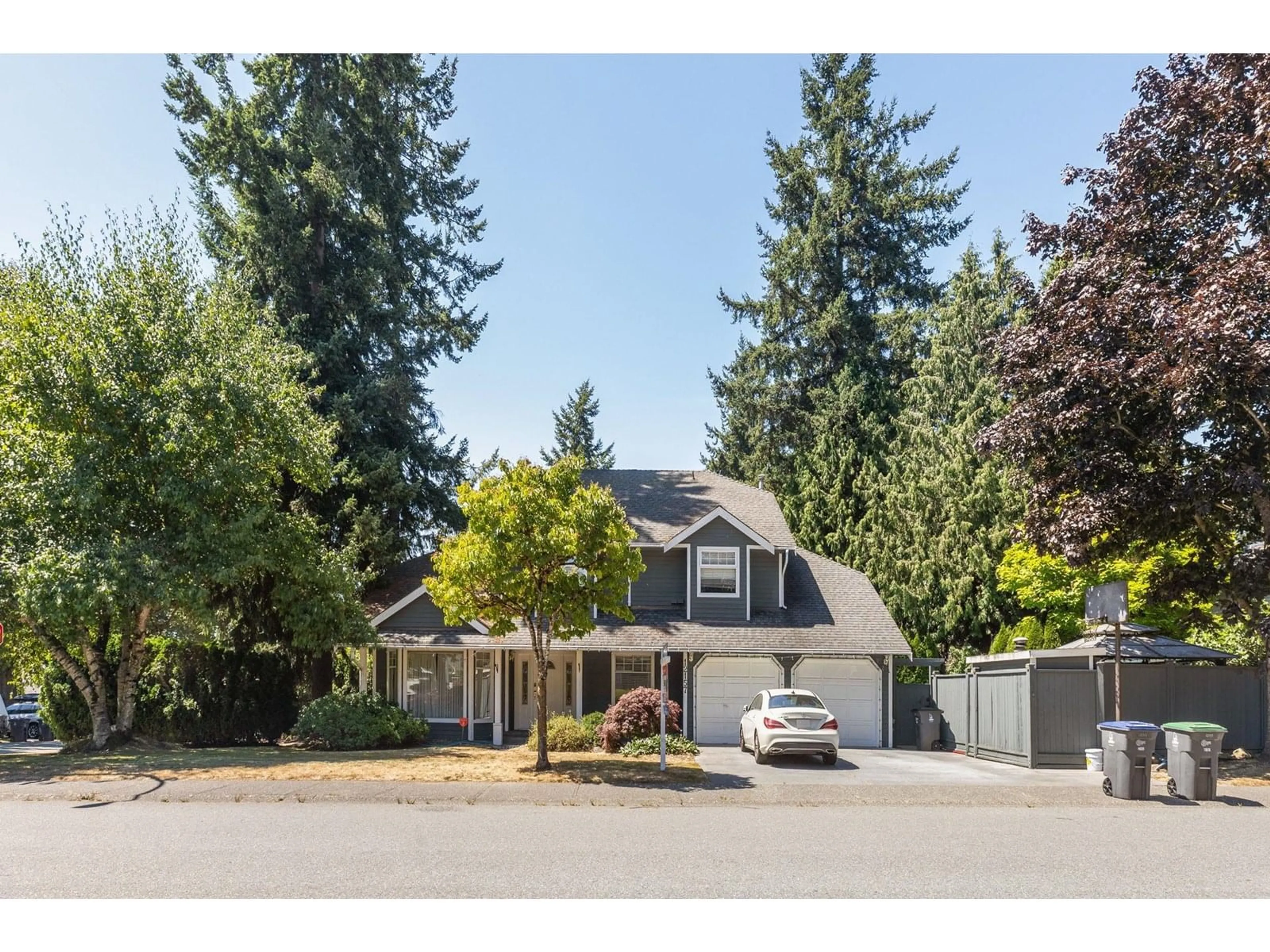 Home with vinyl exterior material, street for 12157 BOUNDARY SOUTH, Surrey British Columbia V3X2B7