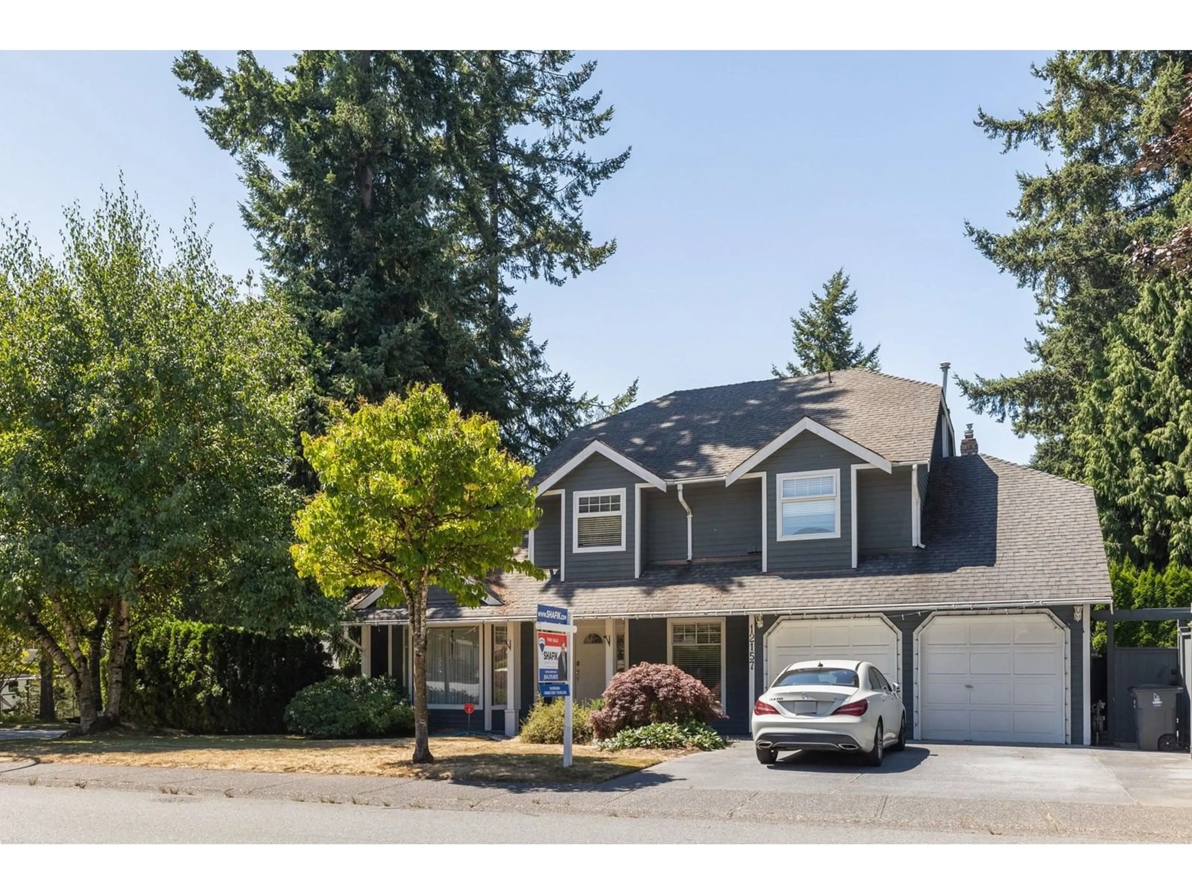 Home with vinyl exterior material, street for 12157 BOUNDARY SOUTH, Surrey British Columbia V3X2B7