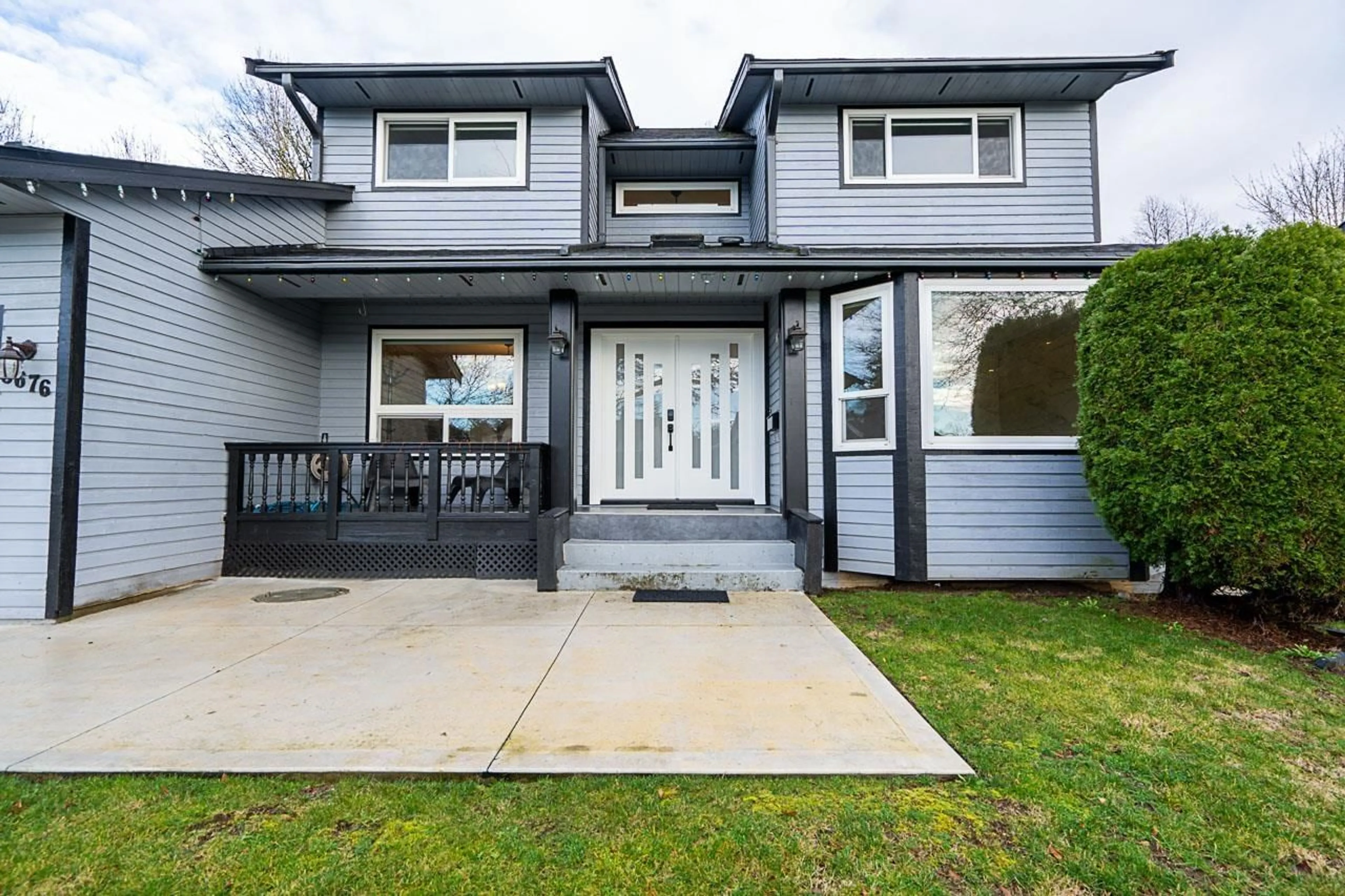 Home with vinyl exterior material, street for 8676 146A, Surrey British Columbia V3S6N7