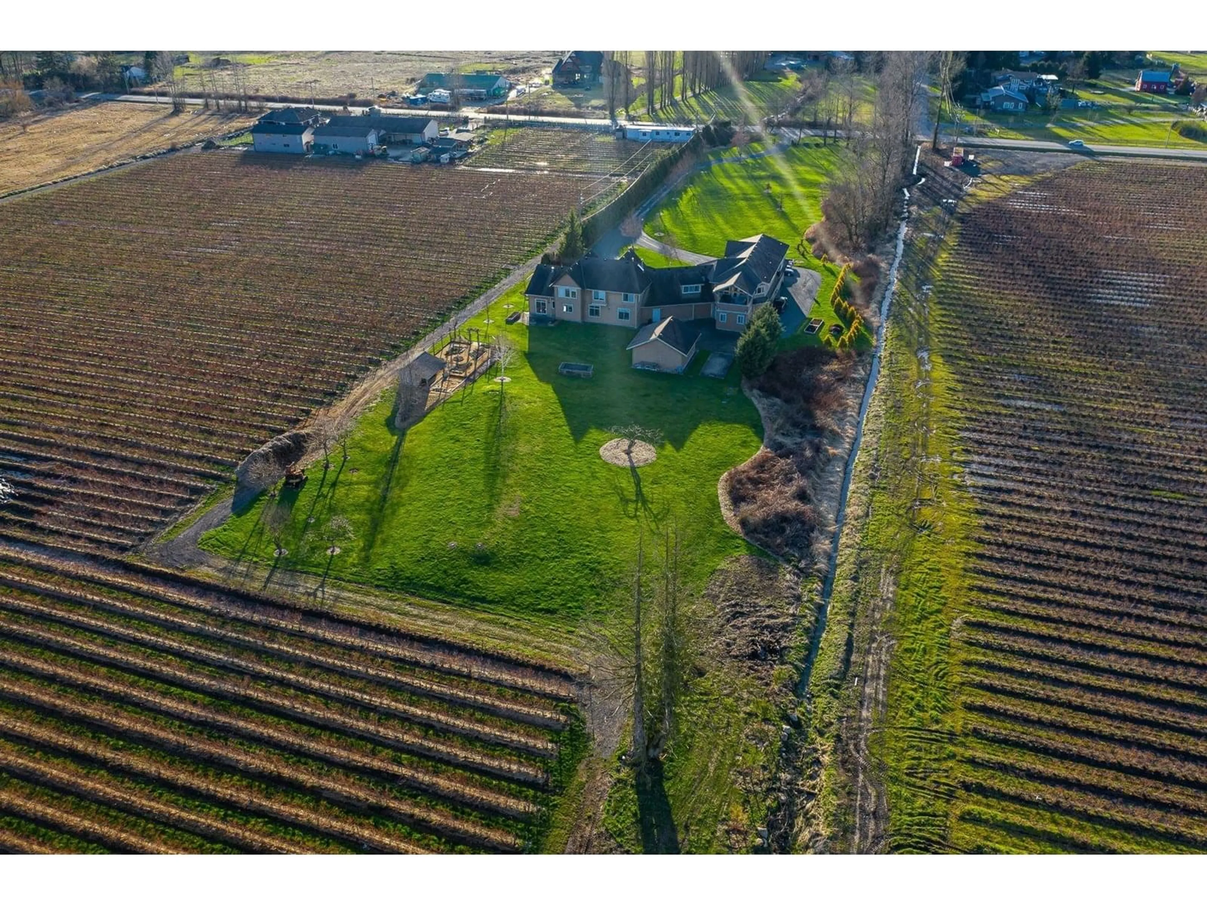 A pic from outside/outdoor area/front of a property/back of a property/a pic from drone, street for 3180 216, Langley British Columbia V2Z2E6