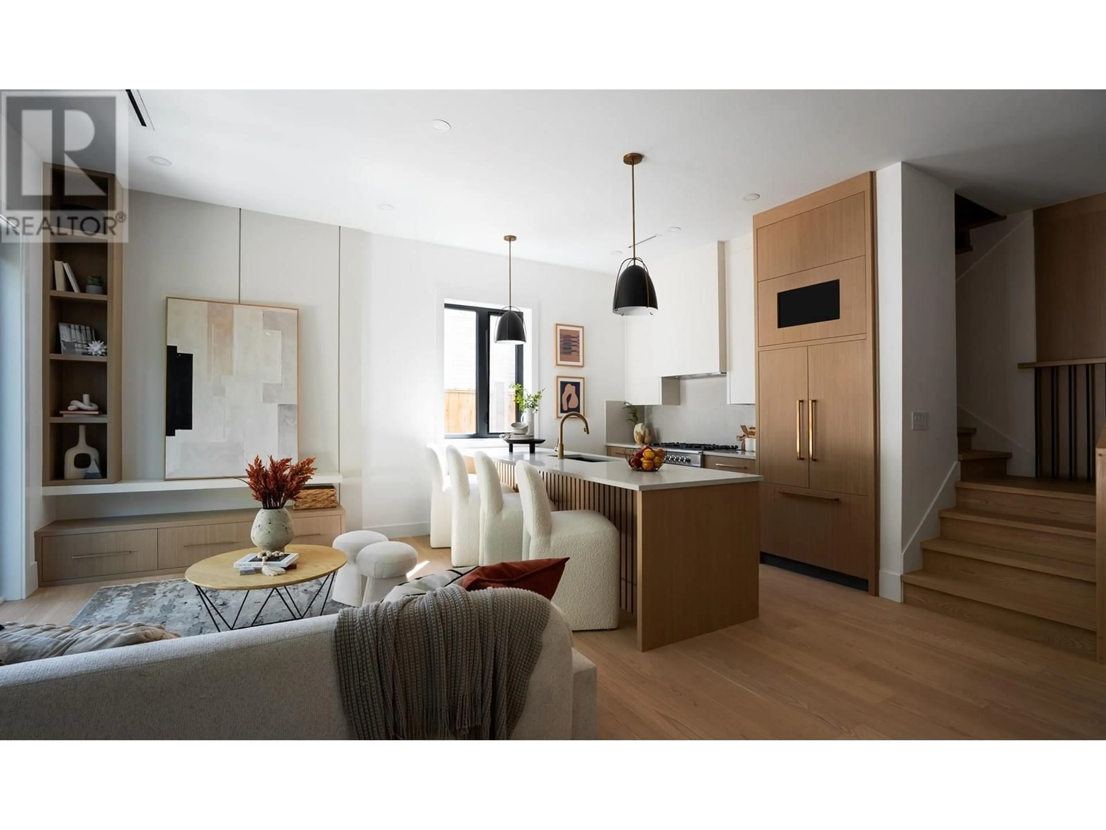 Open concept kitchen, wood/laminate floor for 1 - 356 40TH AVENUE, Vancouver British Columbia V5W1L9