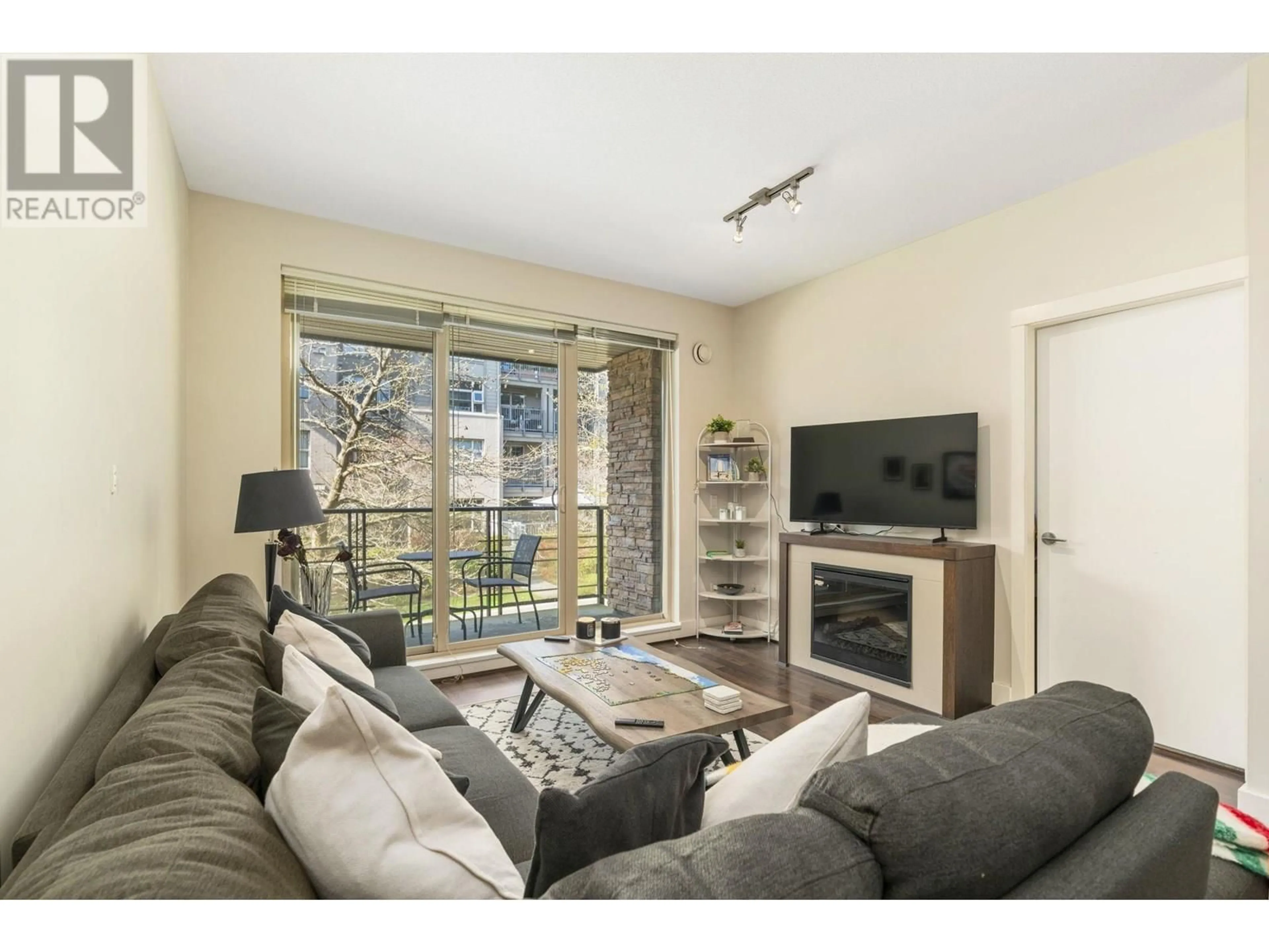 Living room with furniture, unknown for 212 - 3478 WESBROOK MALL, Vancouver British Columbia V6S0B6