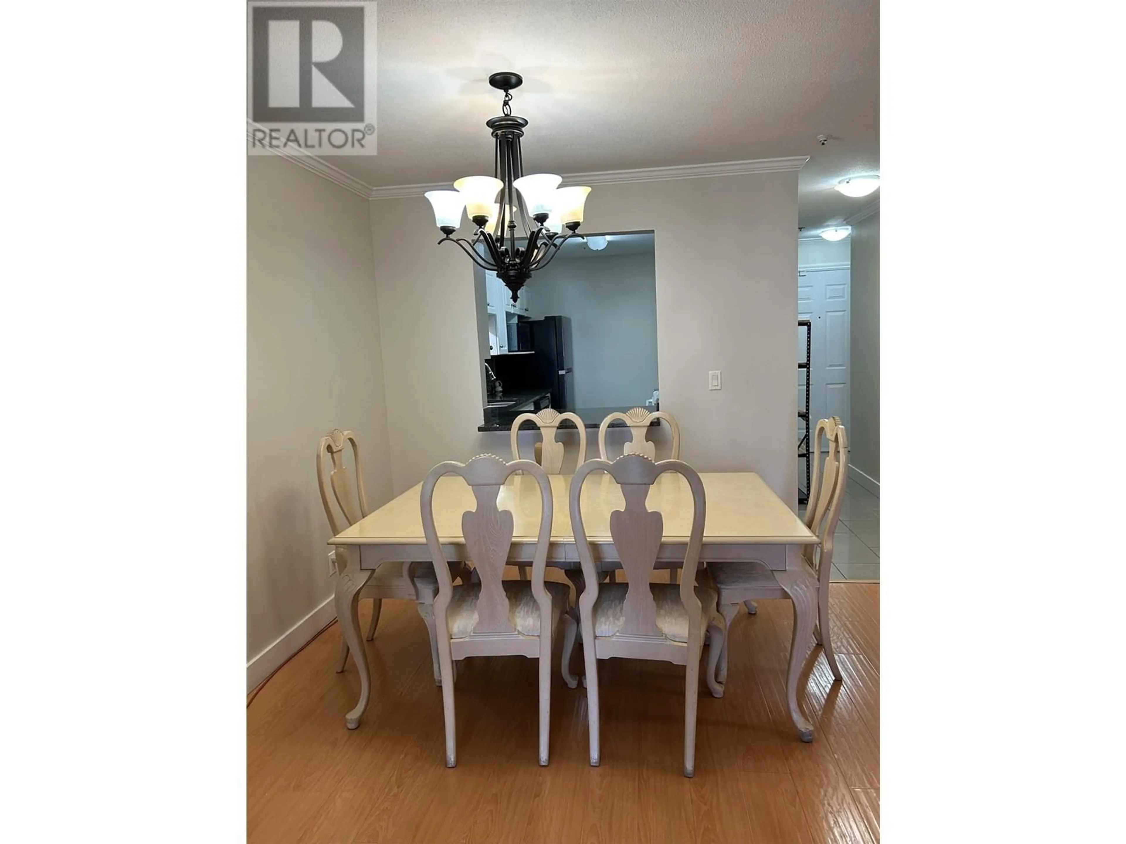 Dining room, wood/laminate floor for 203 - 1958 47TH AVENUE, Vancouver British Columbia V5P3X5