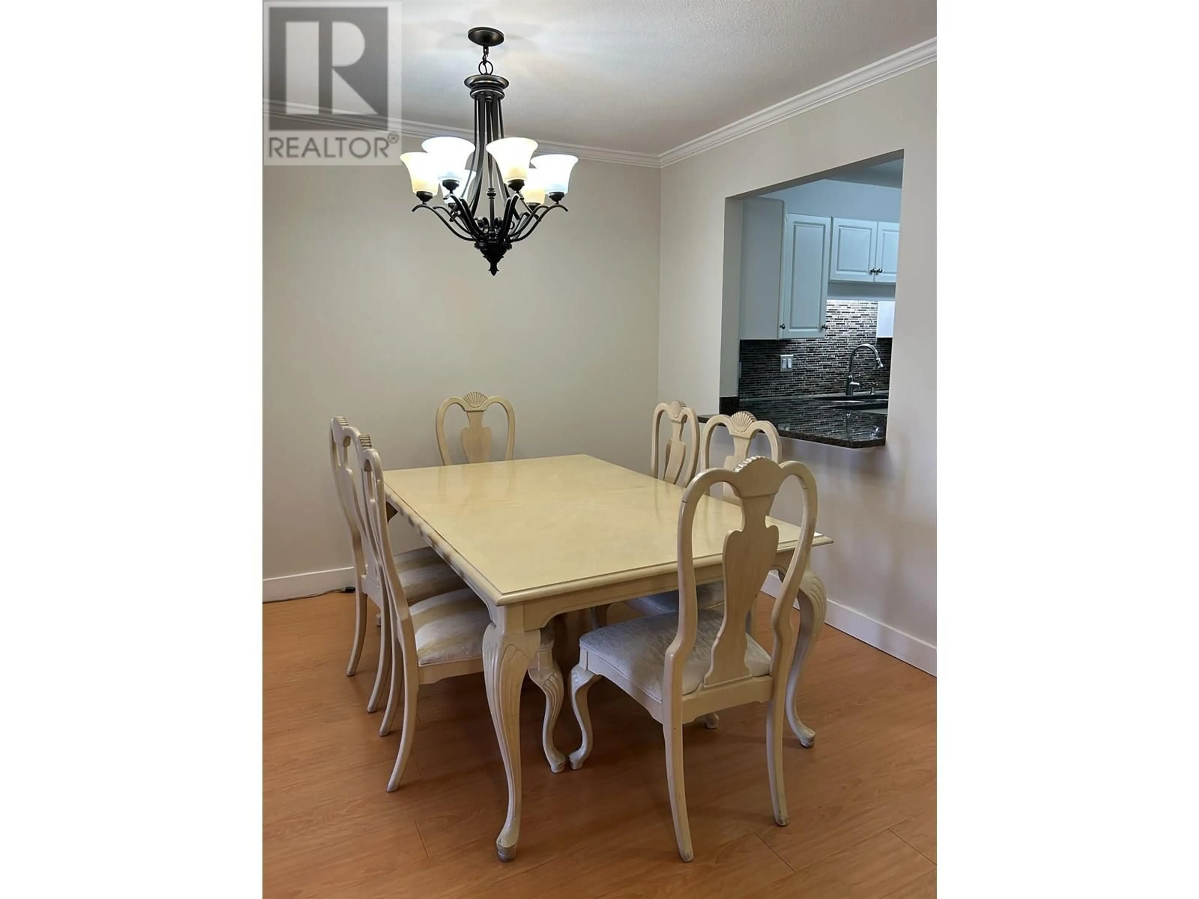 Dining room, wood/laminate floor for 203 - 1958 47TH AVENUE, Vancouver British Columbia V5P3X5