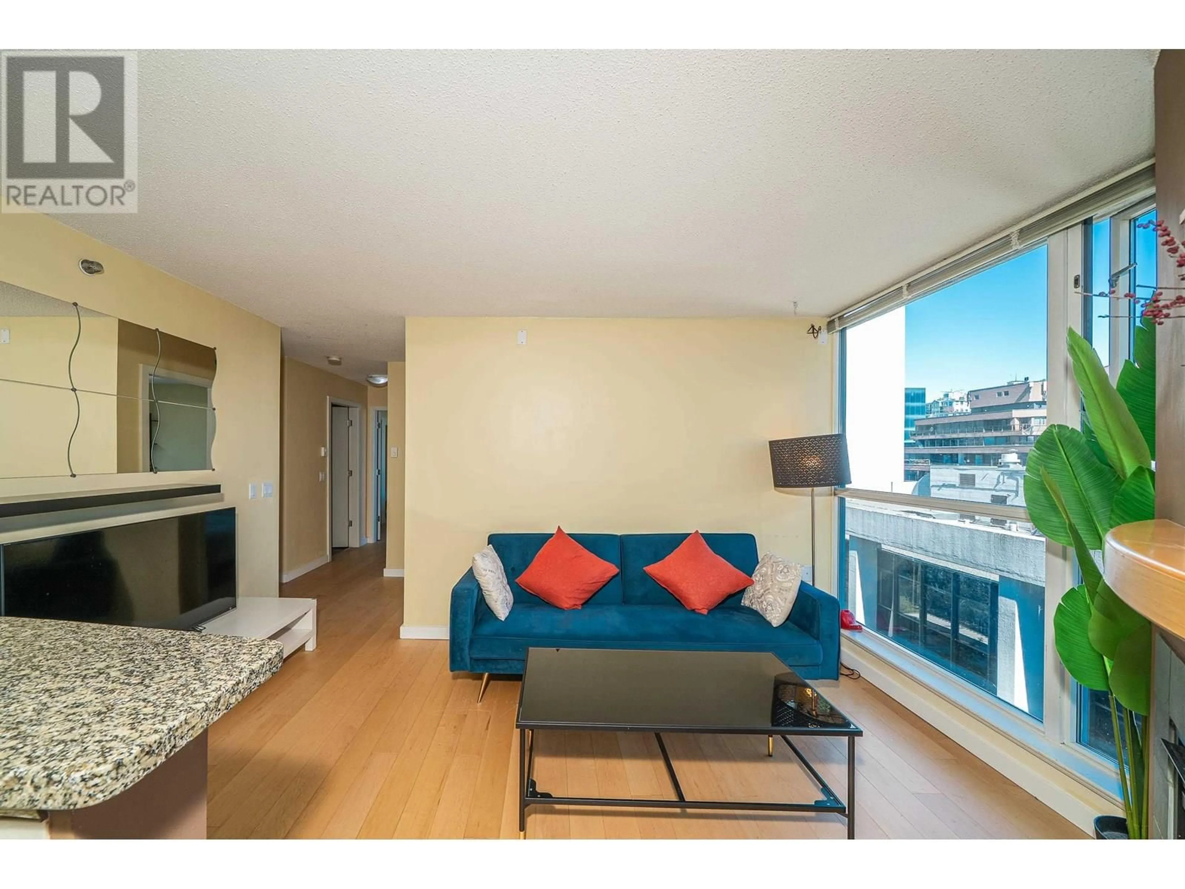 Living room with furniture, wood/laminate floor for 1509 - 1068 HORNBY STREET, Vancouver British Columbia V6Z2Y7