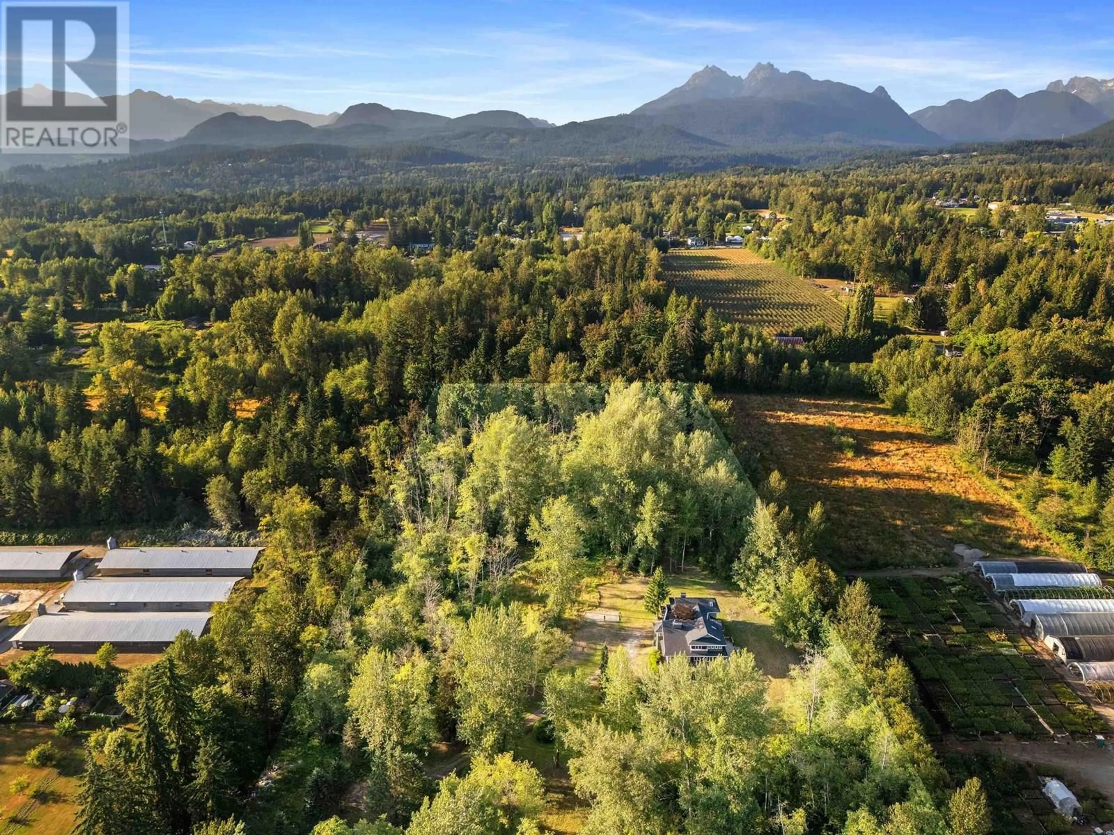 A pic from outside/outdoor area/front of a property/back of a property/a pic from drone, mountain view for 24411 116 AVENUE, Maple Ridge British Columbia V4R1L7