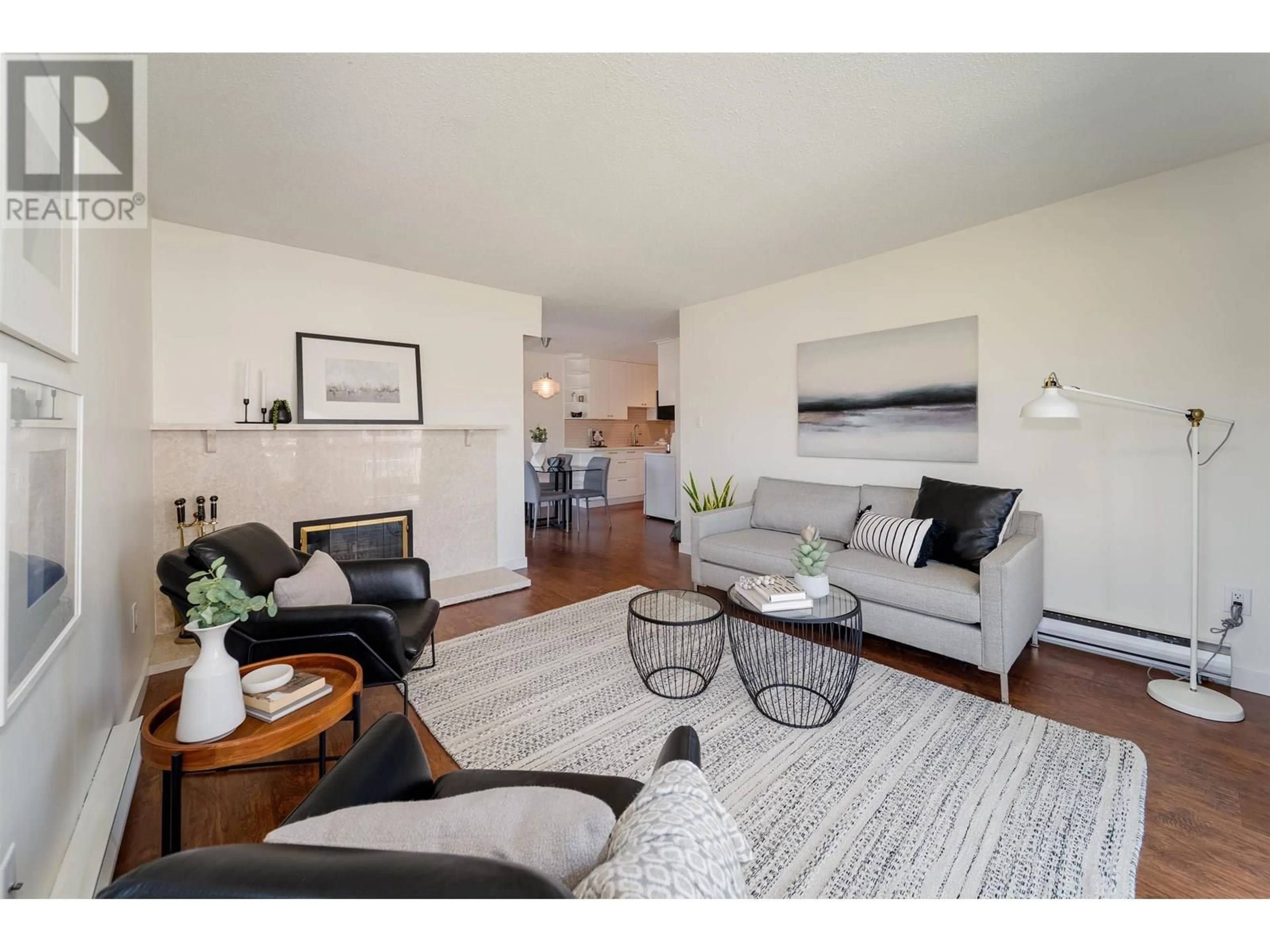 Living room with furniture, wood/laminate floor for 406 - 3680 7TH AVENUE, Vancouver British Columbia V6R1W4