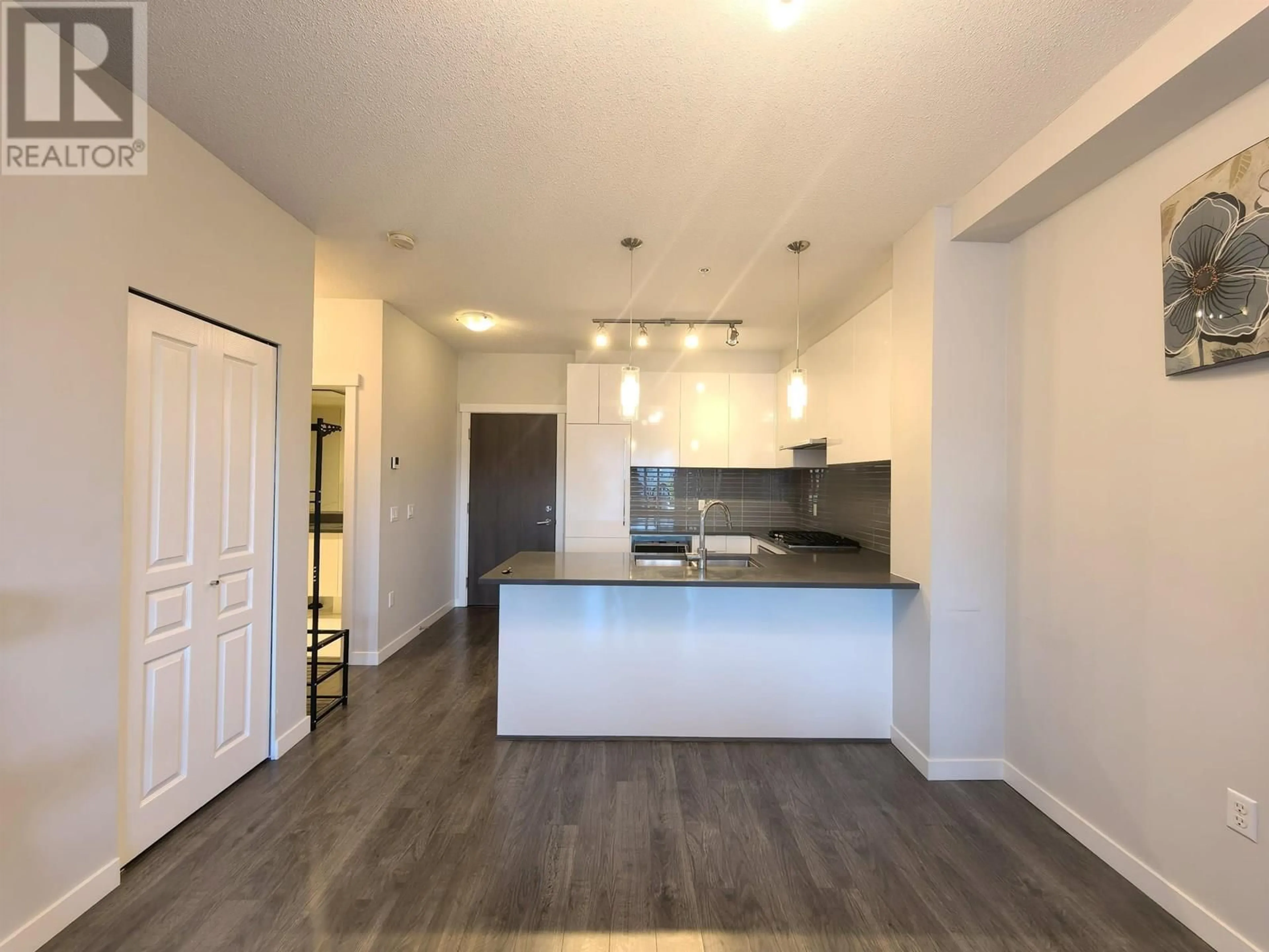 Open concept kitchen, wood/laminate floor for 519 - 9366 TOMICKI AVENUE, Richmond British Columbia V6X0N9