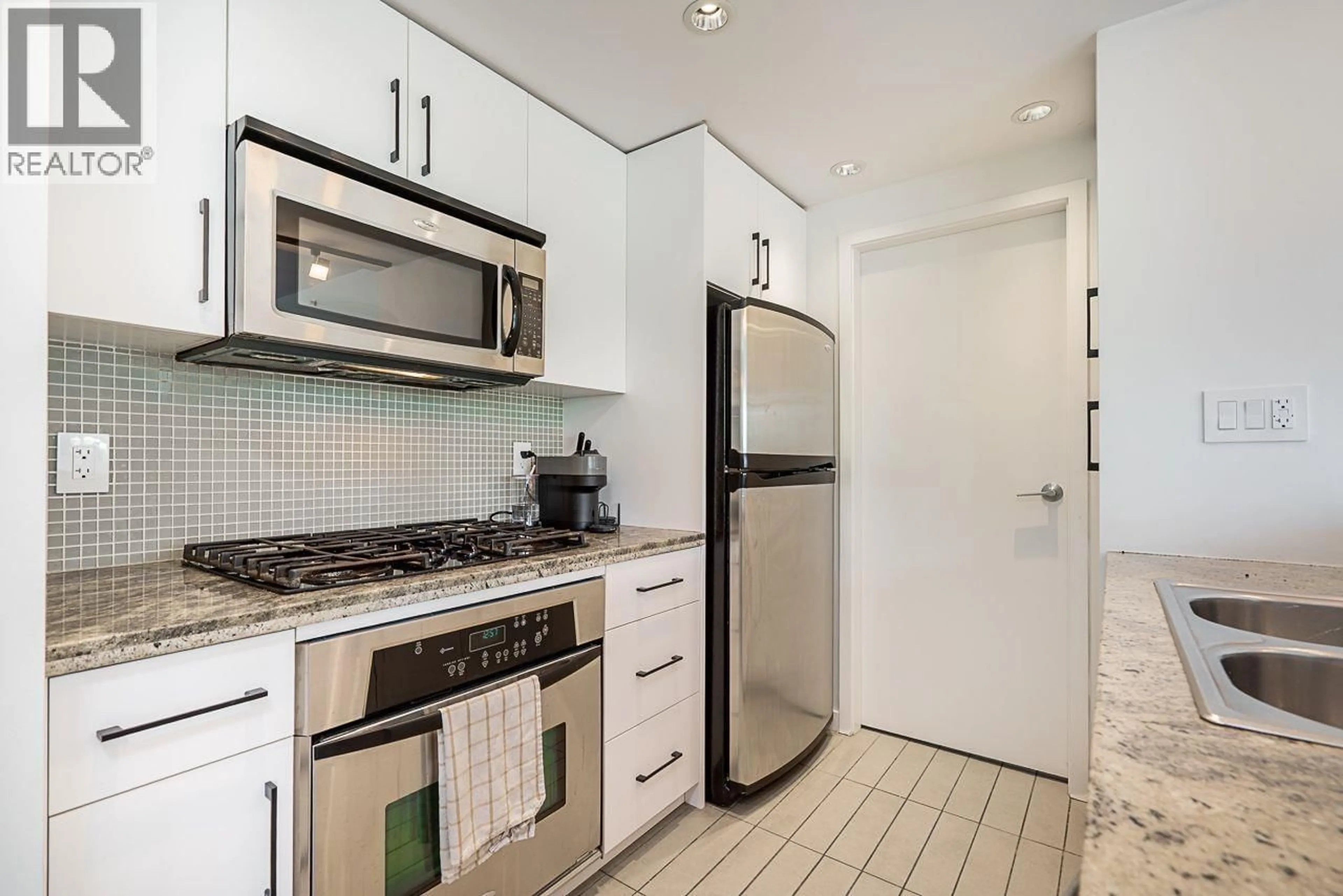 Standard kitchen, ceramic/tile floor for 603 - 980 COOPERAGE WAY, Vancouver British Columbia V6B0C3
