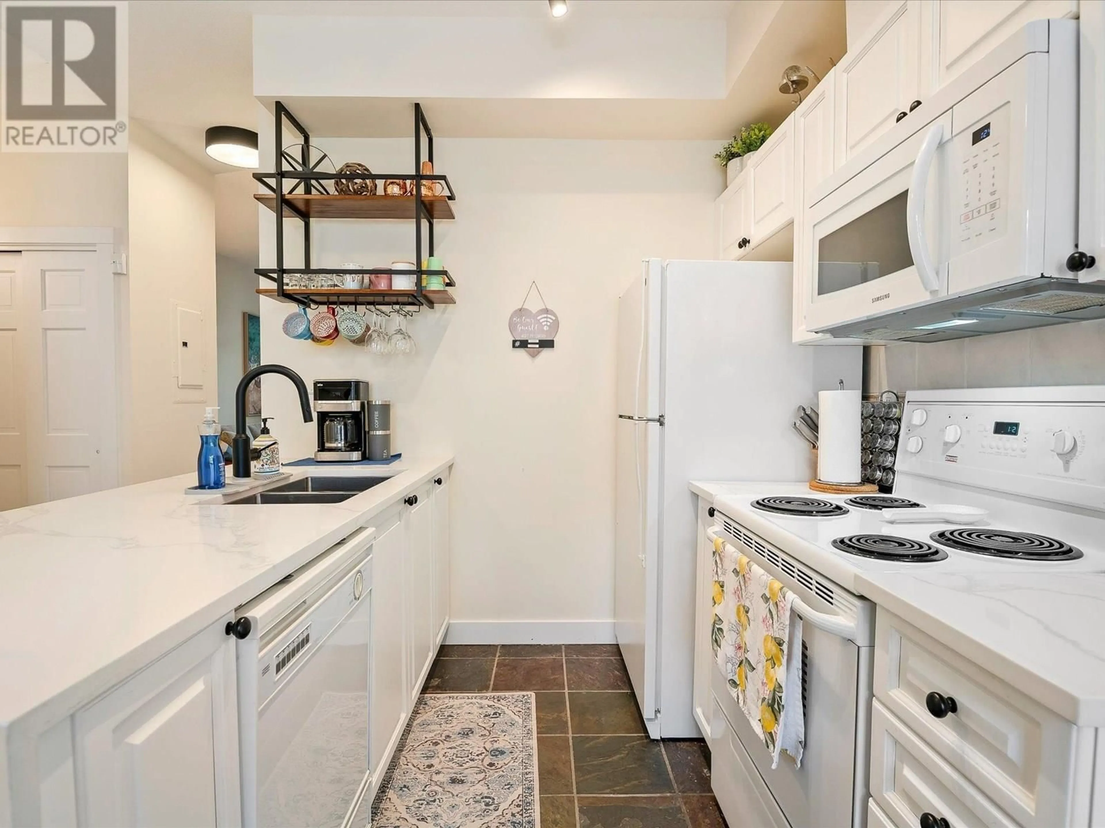 Standard kitchen, ceramic/tile floor for 203 - 4405 BLACKCOMB WAY, Whistler British Columbia V8E0X7