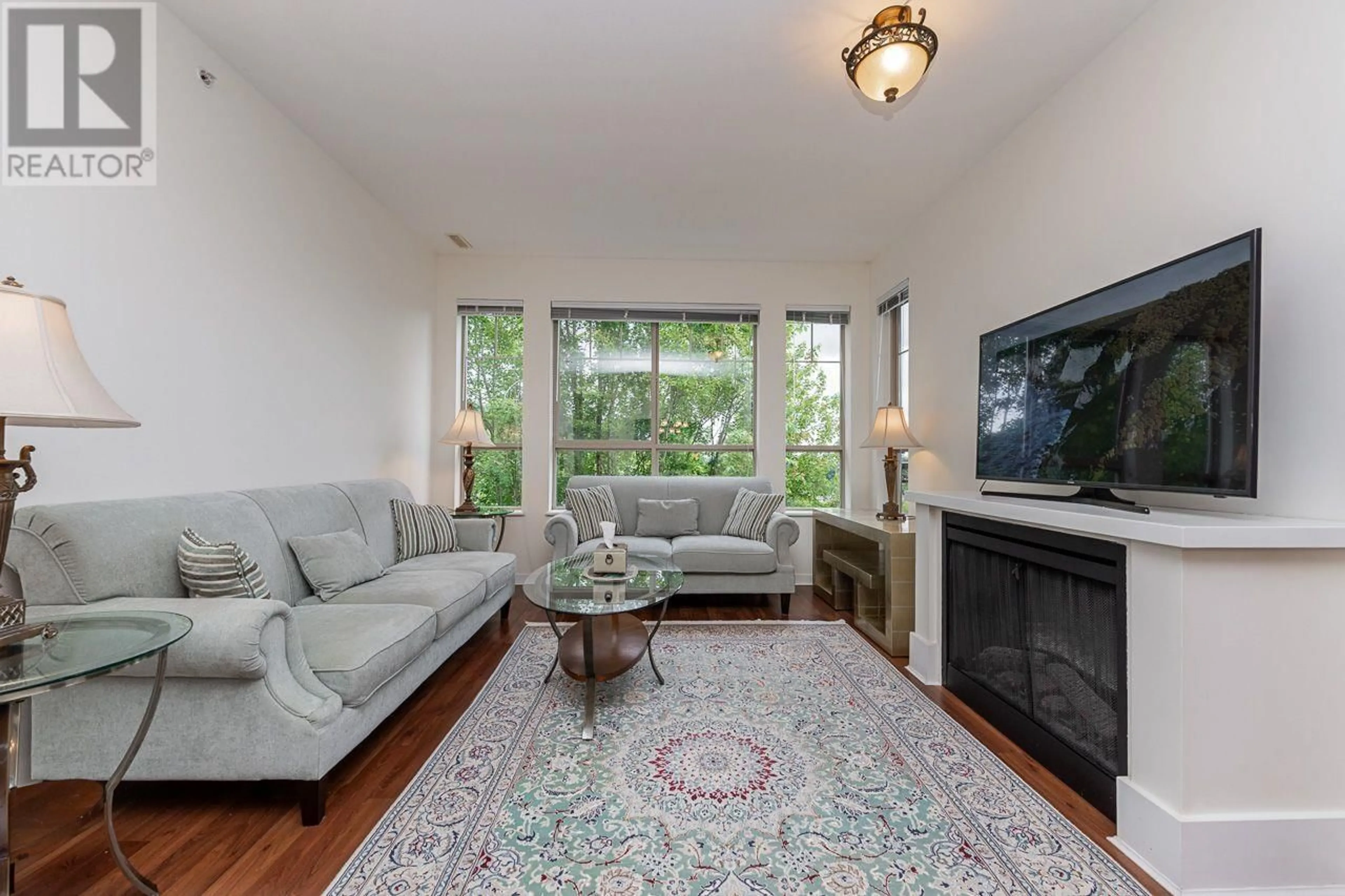 Living room with furniture, unknown for 414 - 2969 WHISPER WAY, Coquitlam British Columbia V3E3S8